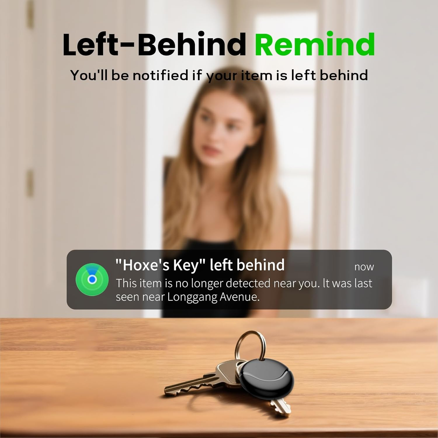 Brelok leży na drewnianym stole. Powiadomienie informuje o pozostawionym kluczu.