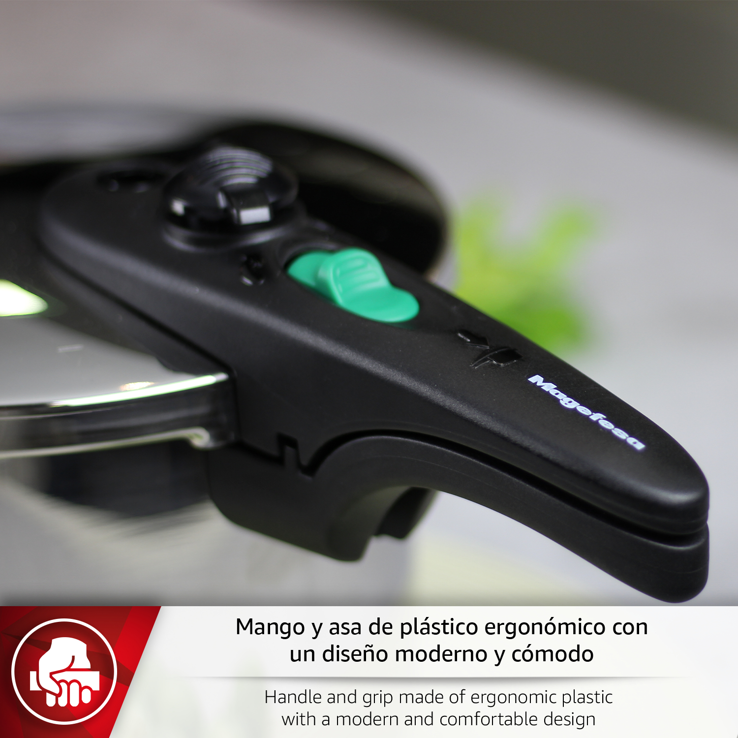 Mango ergonómico negro con botón verde en una olla de acero inoxidable.