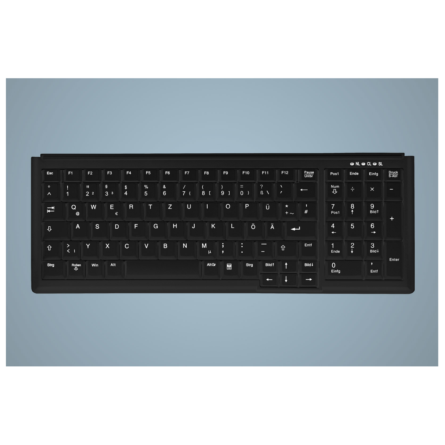 Schwarze Tastatur mit deutschem Layout auf grauem Hintergrund.