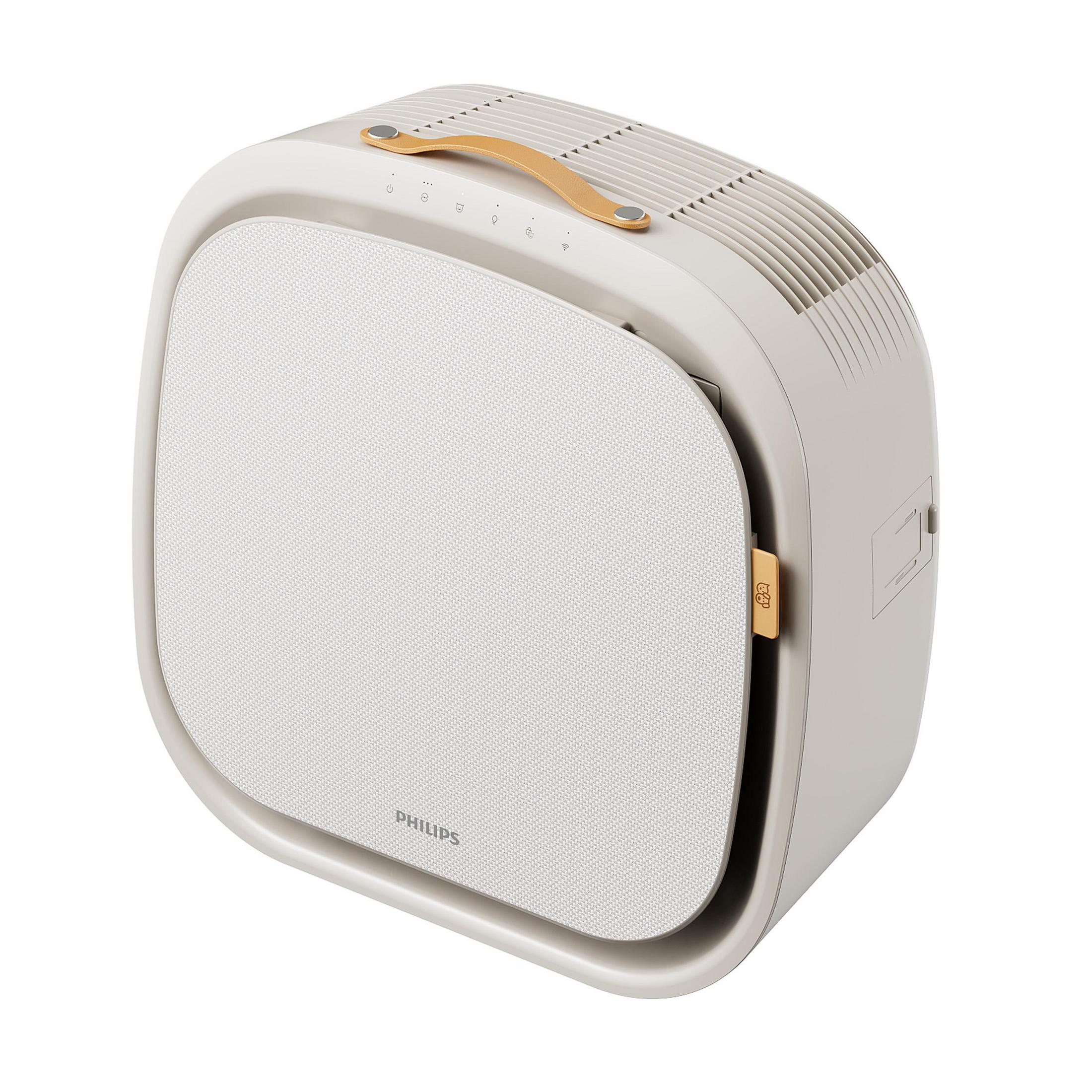 Ein beiger Philips Luftreiniger mit einem Stoffbezug und einem Ledergriff.
