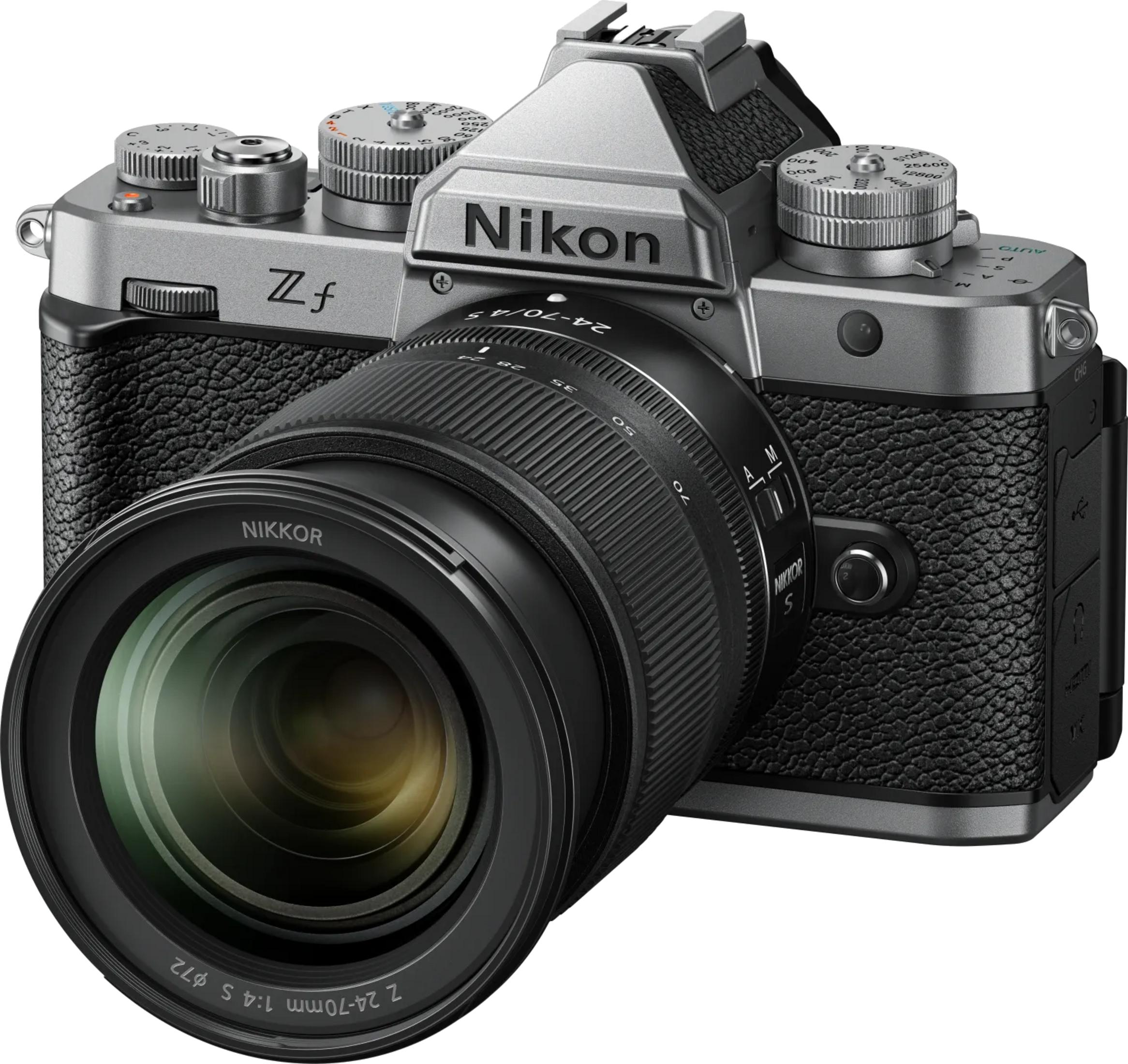 Silberne Nikon Zf Kamera mit schwarzem Objektiv und Ledertextur.
