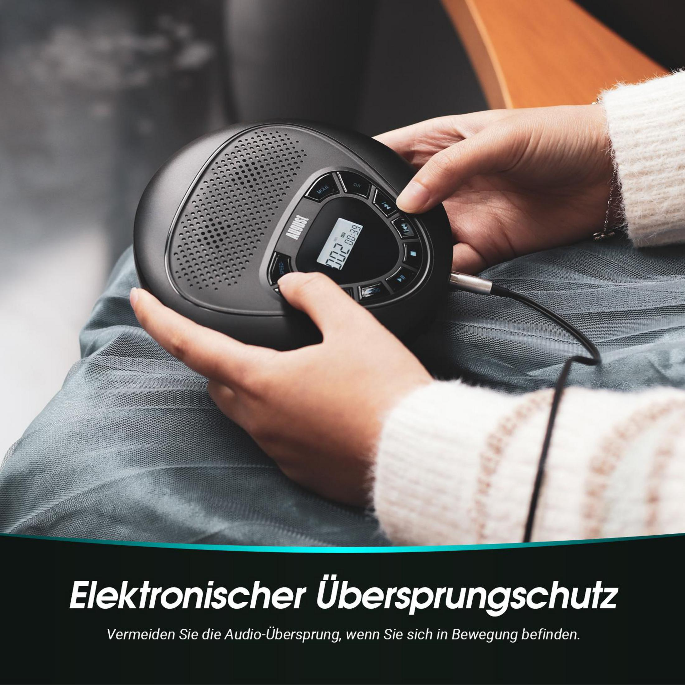 Eine Person hält einen schwarzen CD-Player mit einem Kopfhörerkabel.