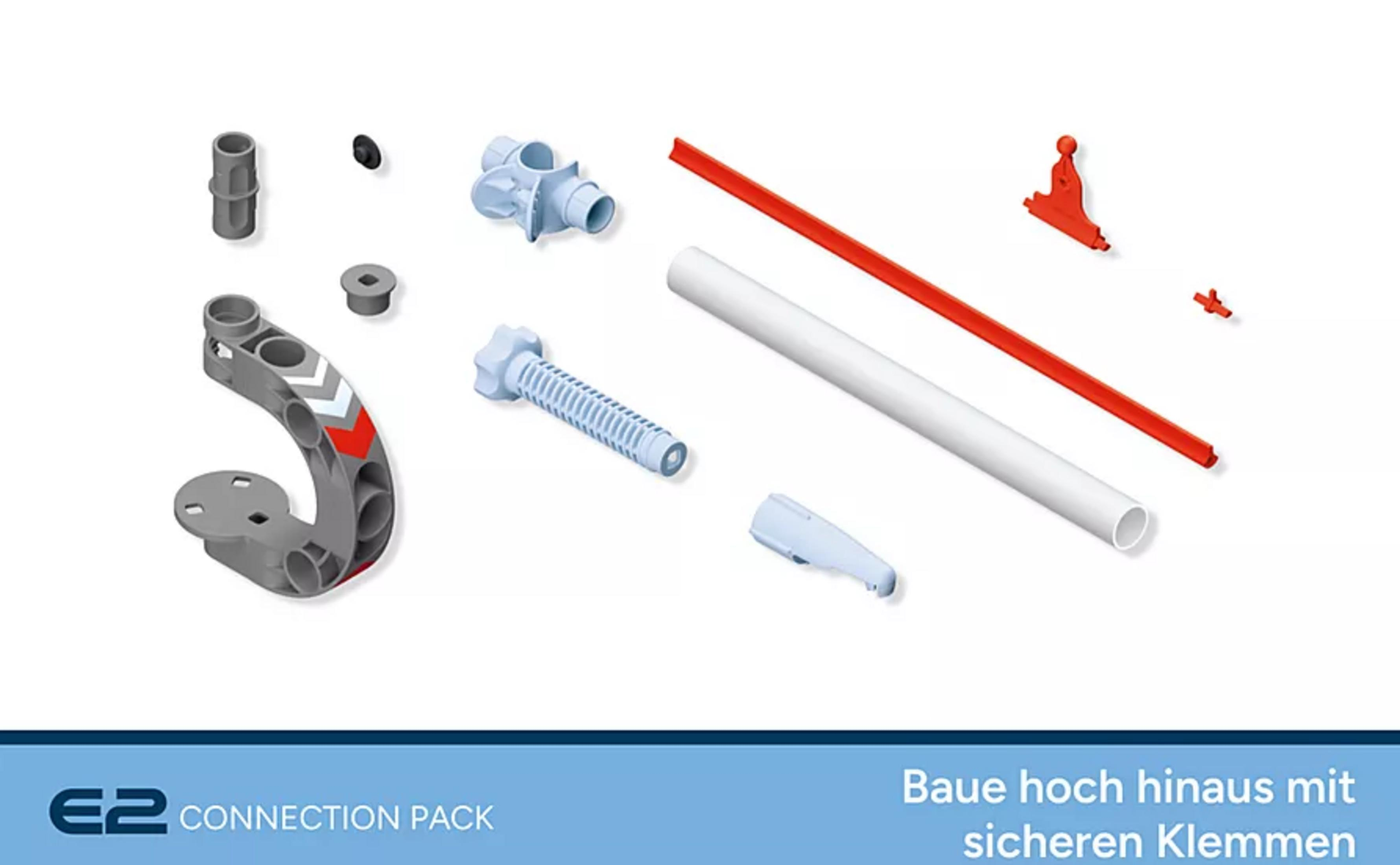 Bauteile aus Kunststoff: graue, blaue und rote Teile wie Rohre, Schrauben und Verbinder.