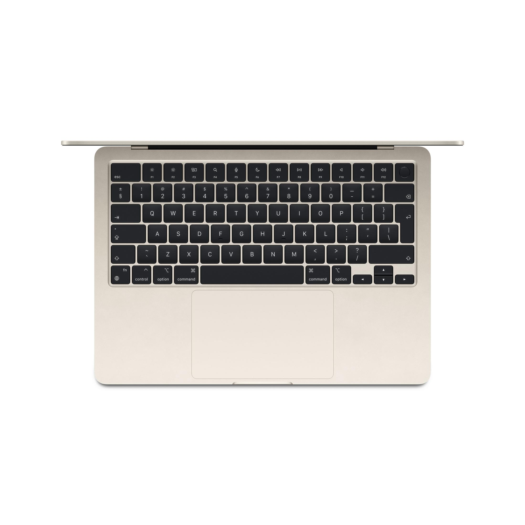 Ein beiger Laptop ist geöffnet und zeigt Tastatur und Trackpad. Der Bildschirm ist nach oben geneigt.
