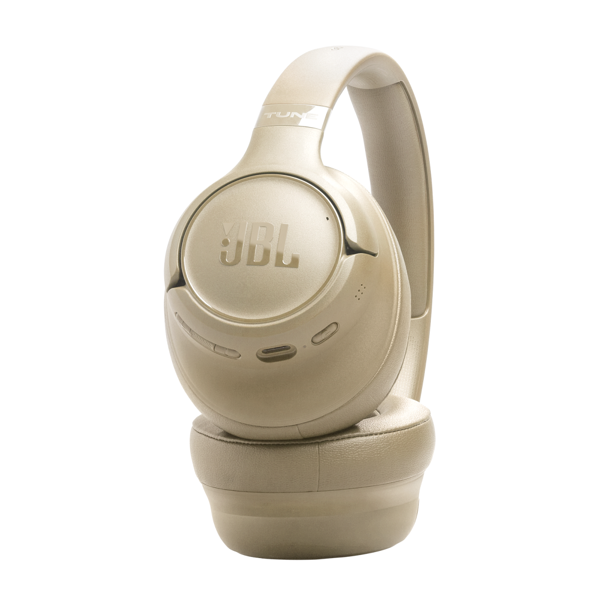 Cuffie JBL beige con scritta TUNE su sfondo nero.