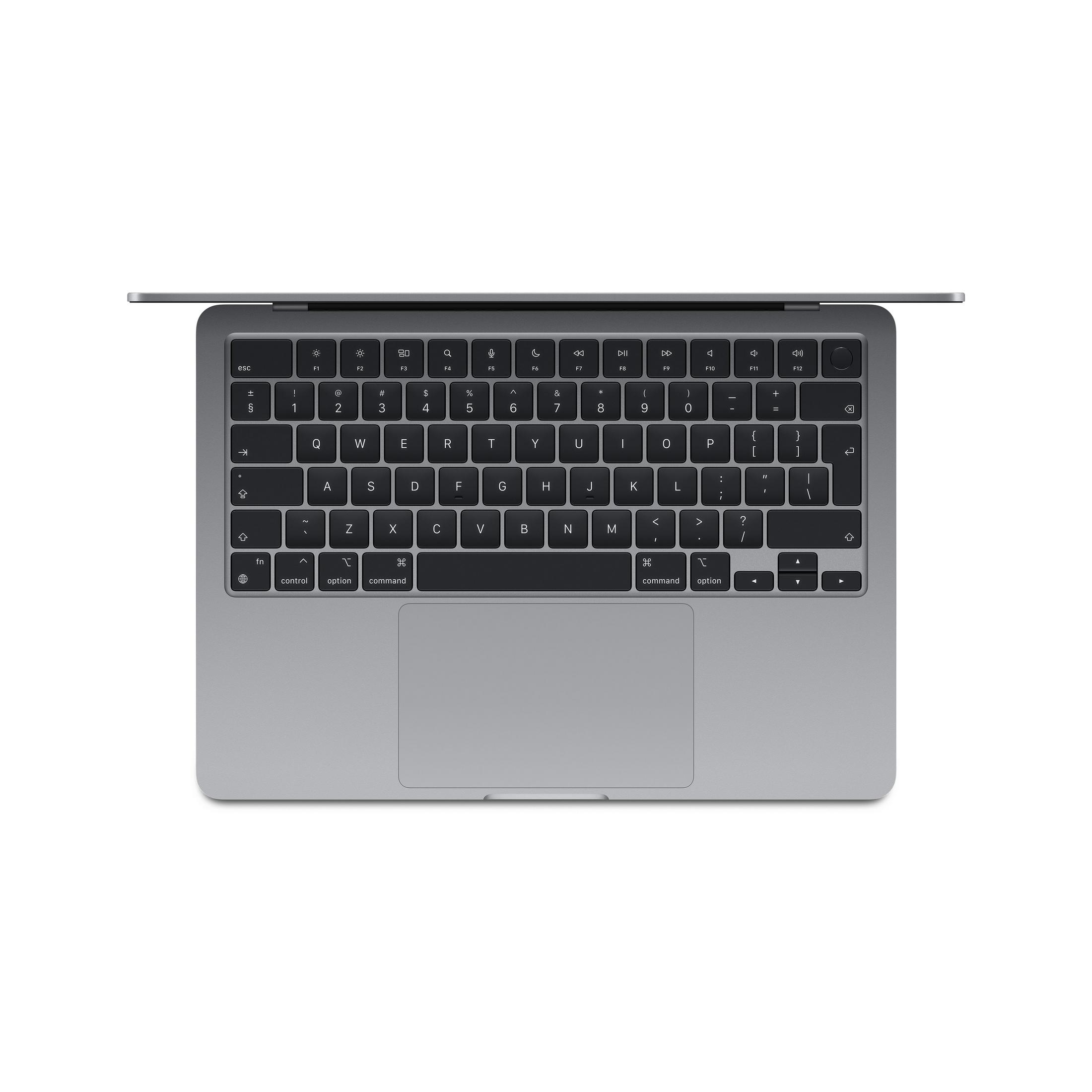 Silberner Laptop mit geöffneter Tastaturansicht, weiße Tastenbeschriftung.