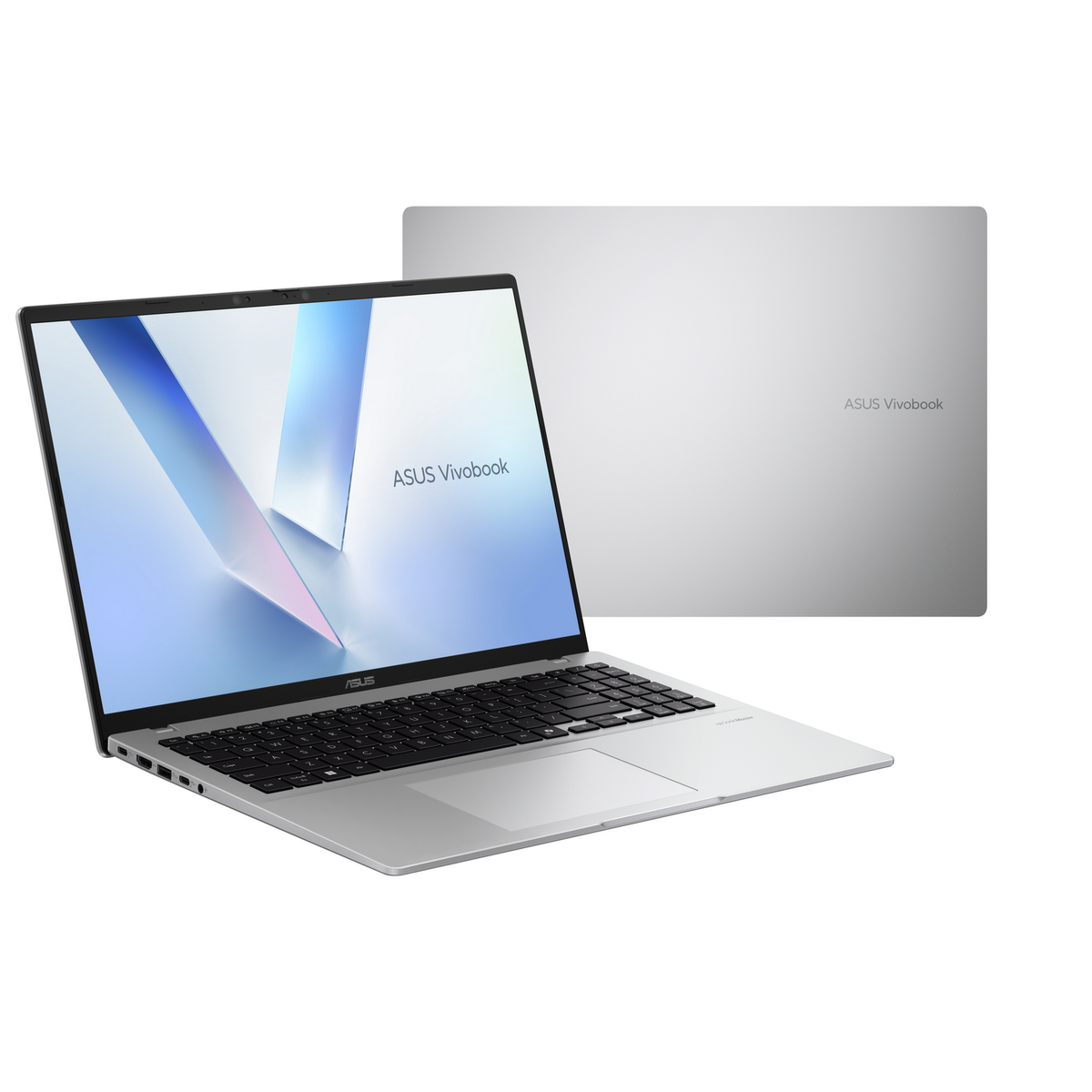 Un portátil ASUS Vivobook plateado está abierto, con su pantalla mostrando un diseño abstracto azul y blanco. Otro portátil cerrado está detrás.