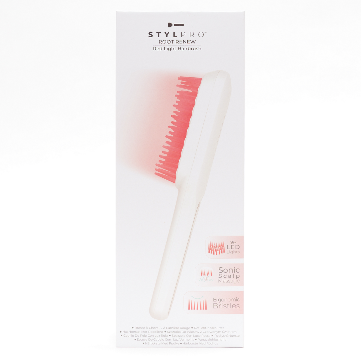 Spazzola bianca per capelli con setole rosse e luce LED.