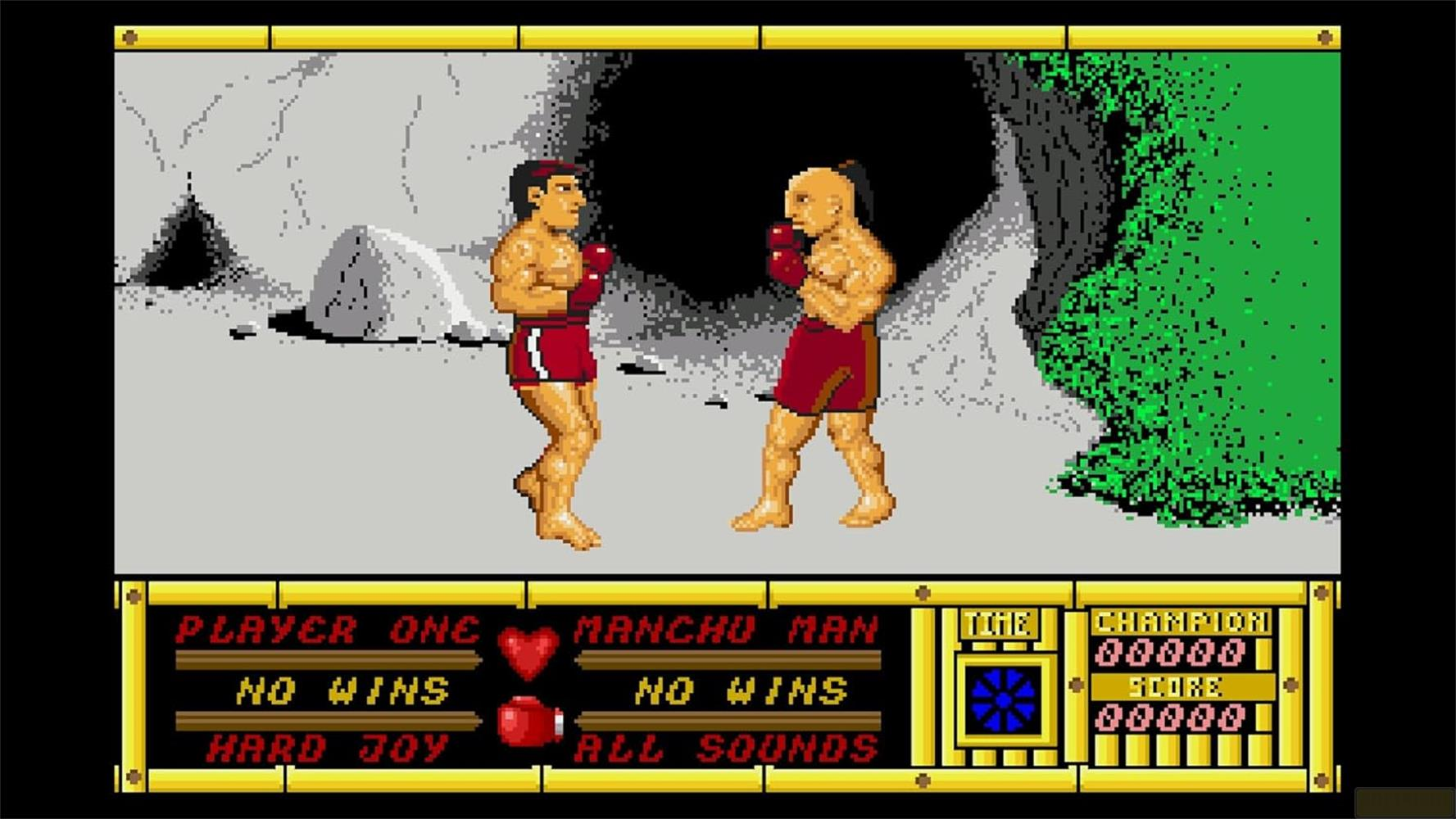 Zwei Boxer in roter Kleidung stehen sich in einer Höhle gegenüber. Spielinfos unten.