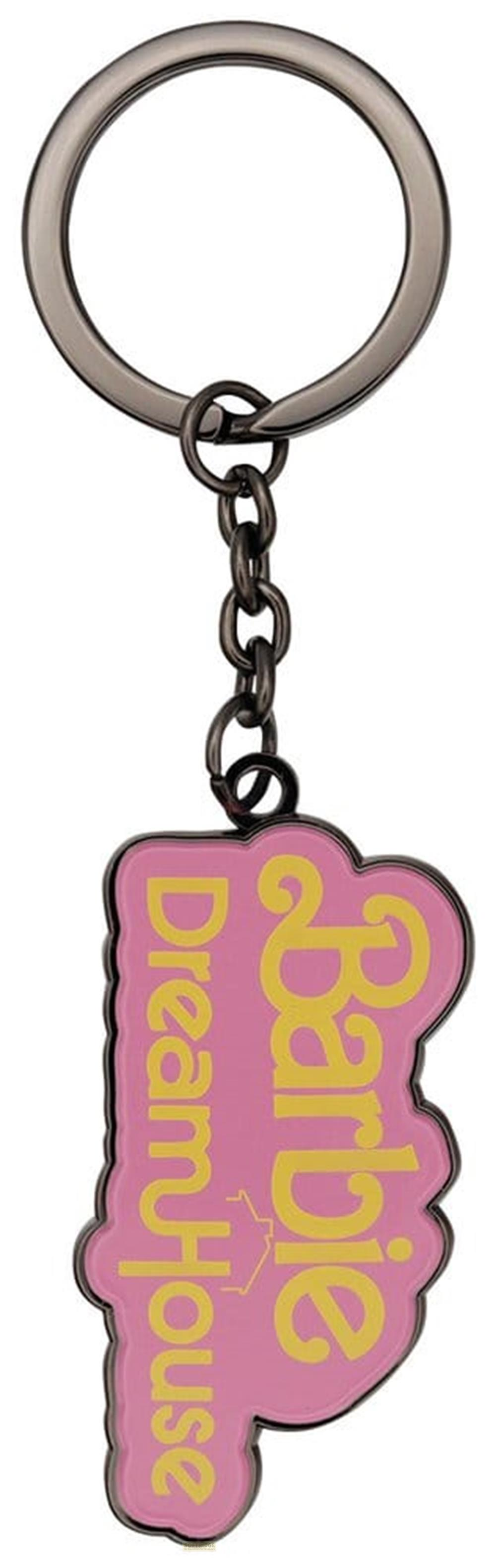 Ein rosafarbener Barbie Dream House Schlüsselanhänger mit gelber Schrift und silbernem Ring.