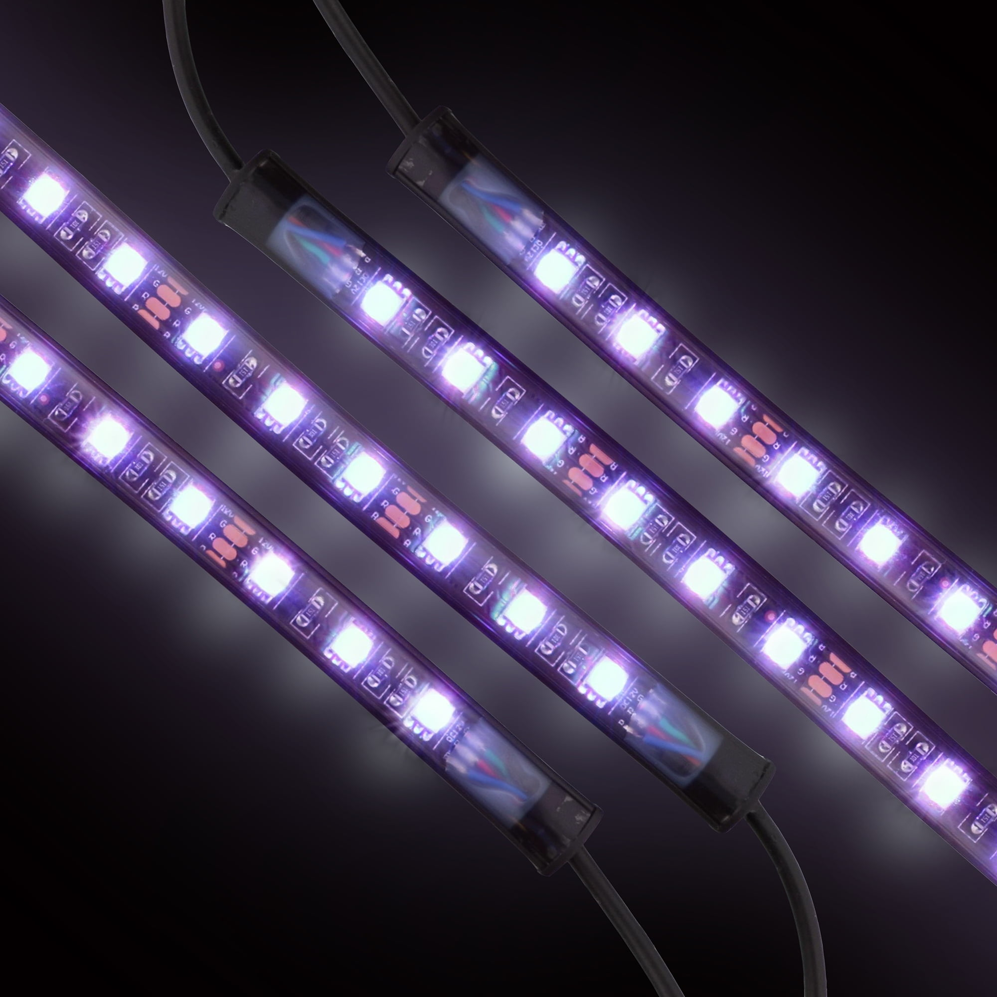 Vier lila LED-Streifen leuchten auf dunklem Hintergrund.