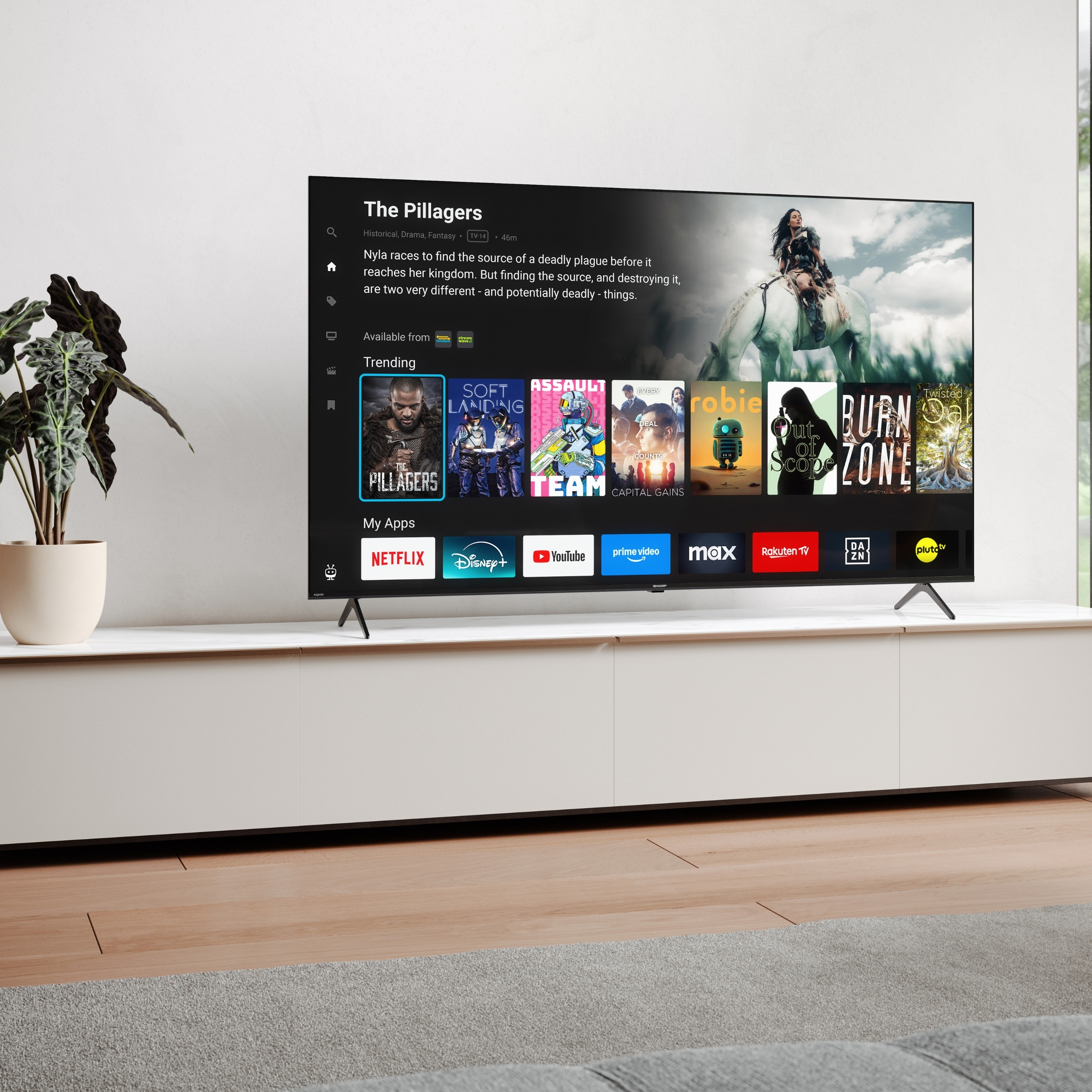 Ein Smart-TV zeigt eine Filmübersicht mit Titeln wie 'The Pillagers' und App-Icons.