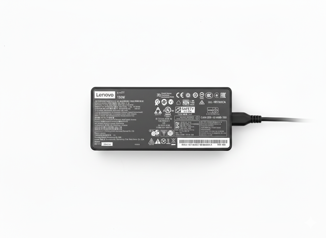 Ein schwarzes Lenovo 150W Netzteil mit vielen Prüfzeichen und Modellnummern.