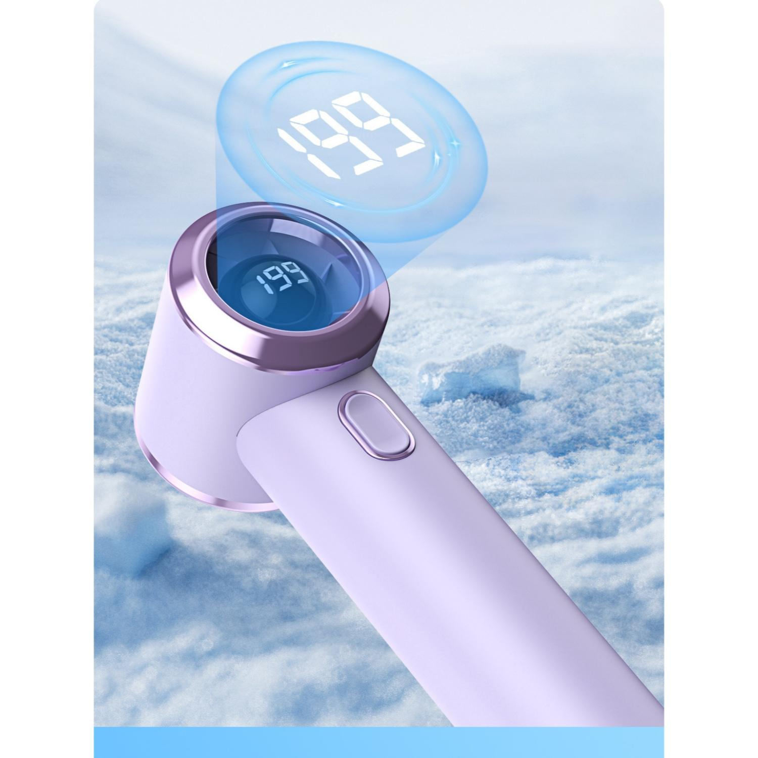 Lila Gerät mit digitaler Anzeige '199' vor einer verschneiten Kulisse.