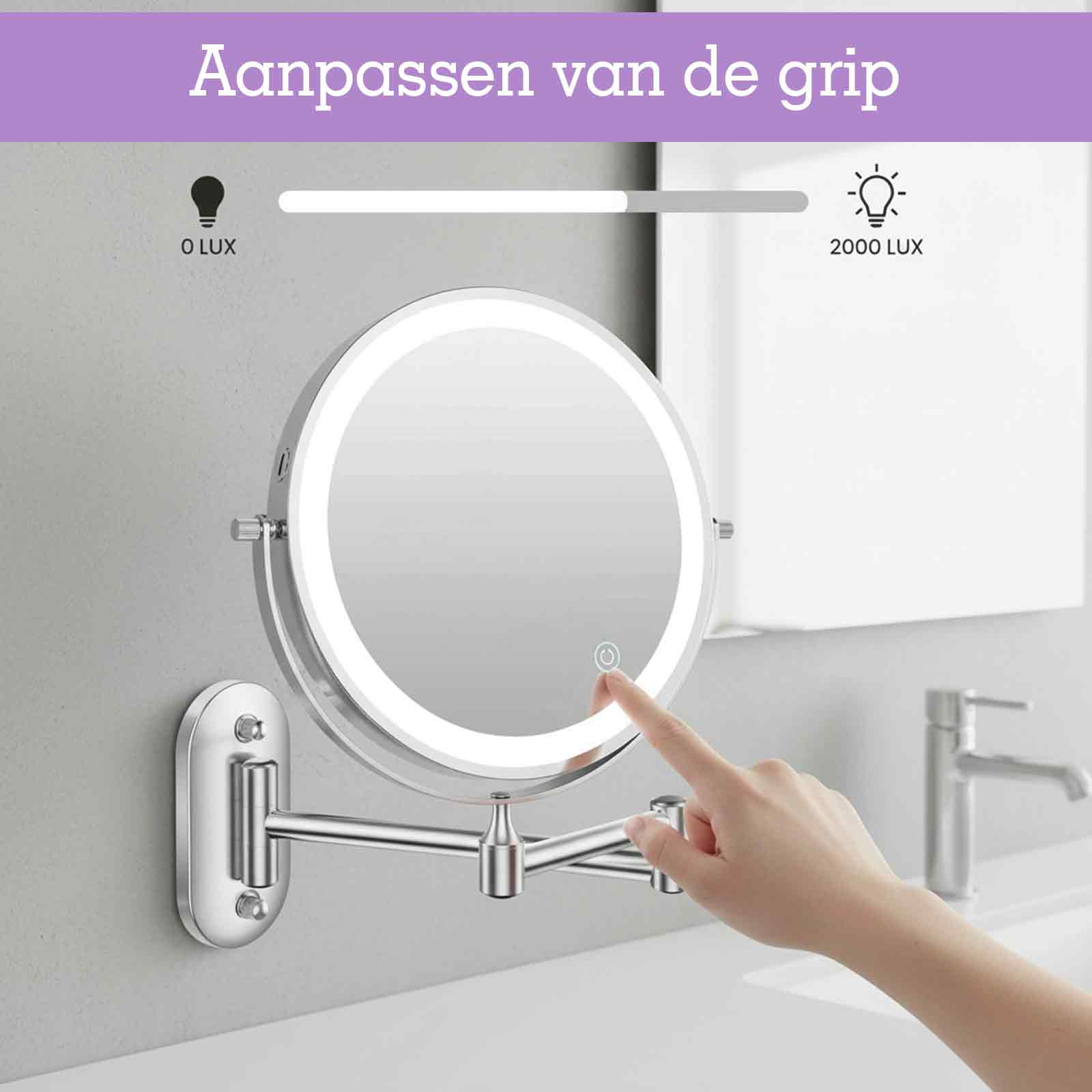 Ein Finger drückt auf einen beleuchteten Spiegel, der an einem Schwenkarm montiert ist.
