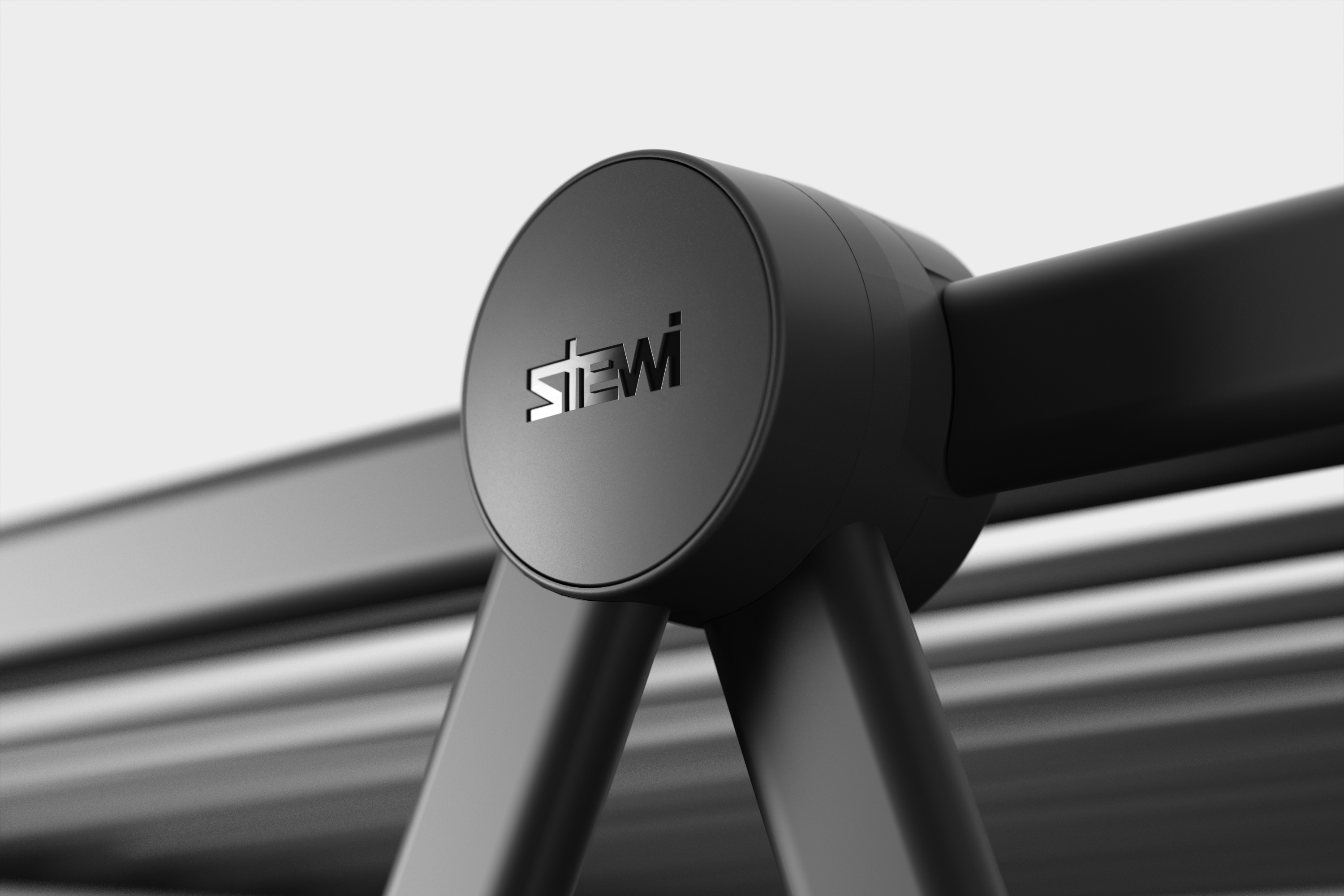 Nahaufnahme eines schwarzen Objekts mit dem Logo "stewi".