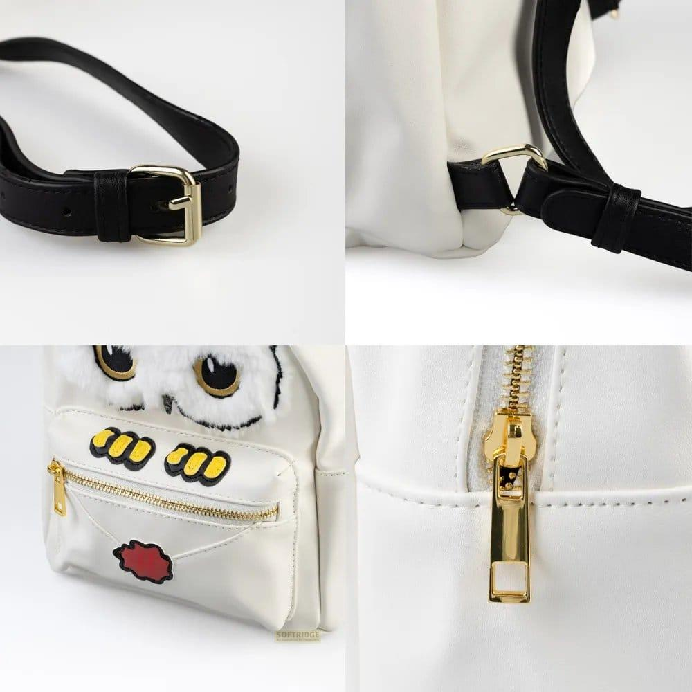 Weiße Rucksack-Details: Gurt, Reißverschluss, Teddy-Applikation.