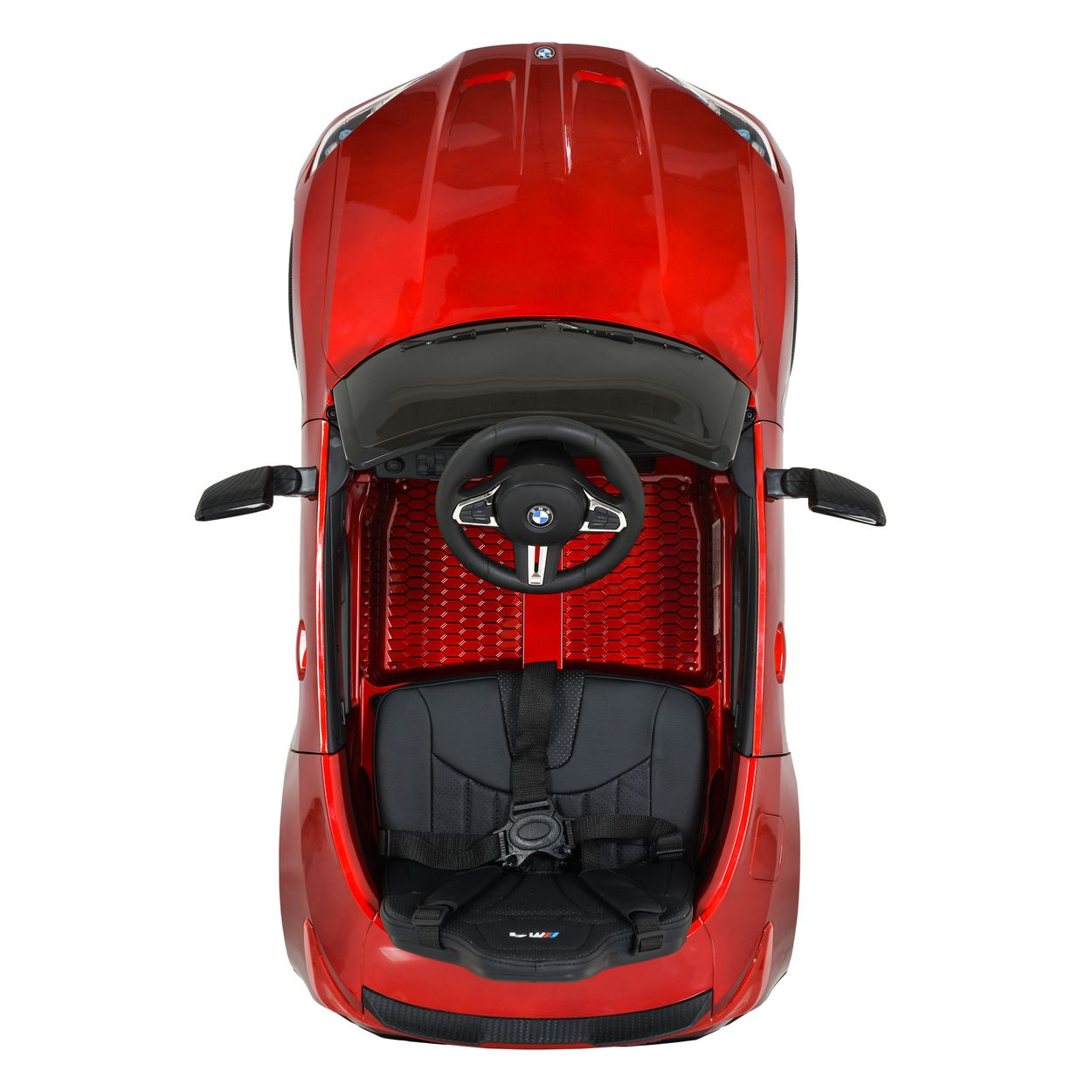 Ein rotes Spielzeugauto von oben, mit schwarzem Sitz und Lenkrad.
