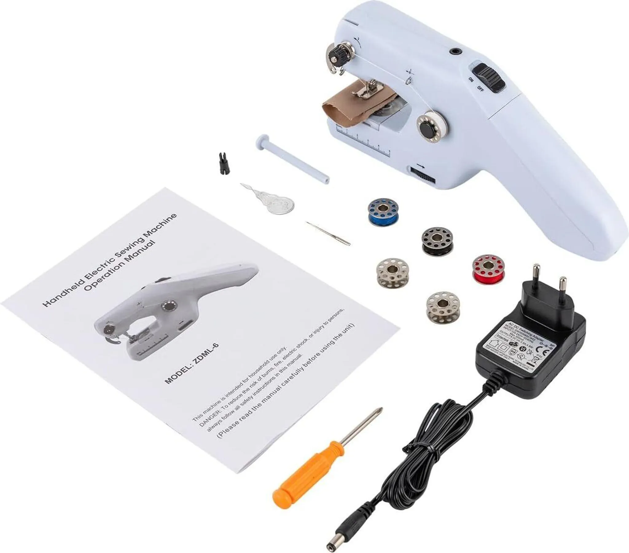 Handnähmaschine mit Zubehör: Nähmaschine, Anleitung, Garnspulen, Netzteil, Schraubendreher.