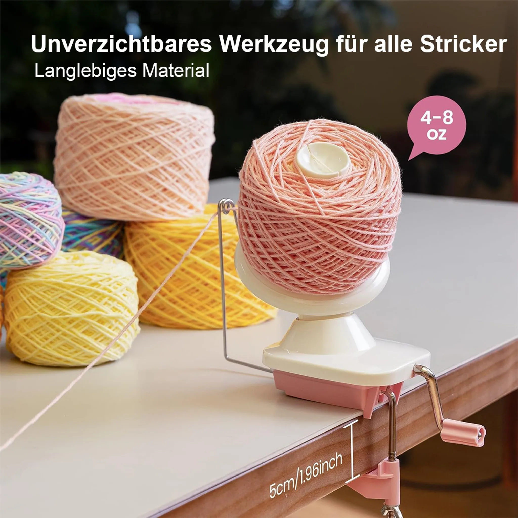 Garnwickler mit Garnknäueln in Rosa, Gelb und Bunt. Tischmontage.