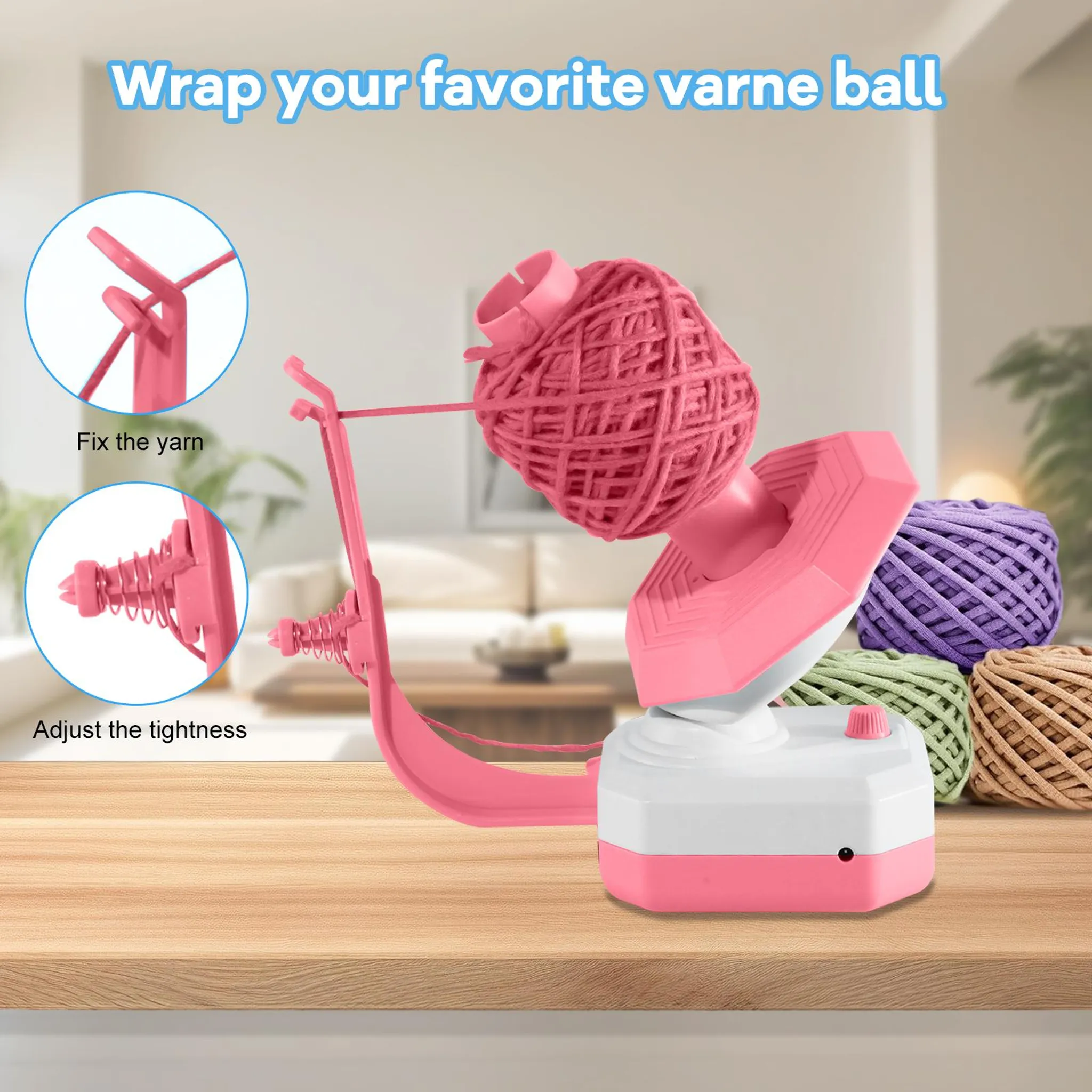 Ein pinker Garnwickler mit Garnball und Garnknäueln daneben.