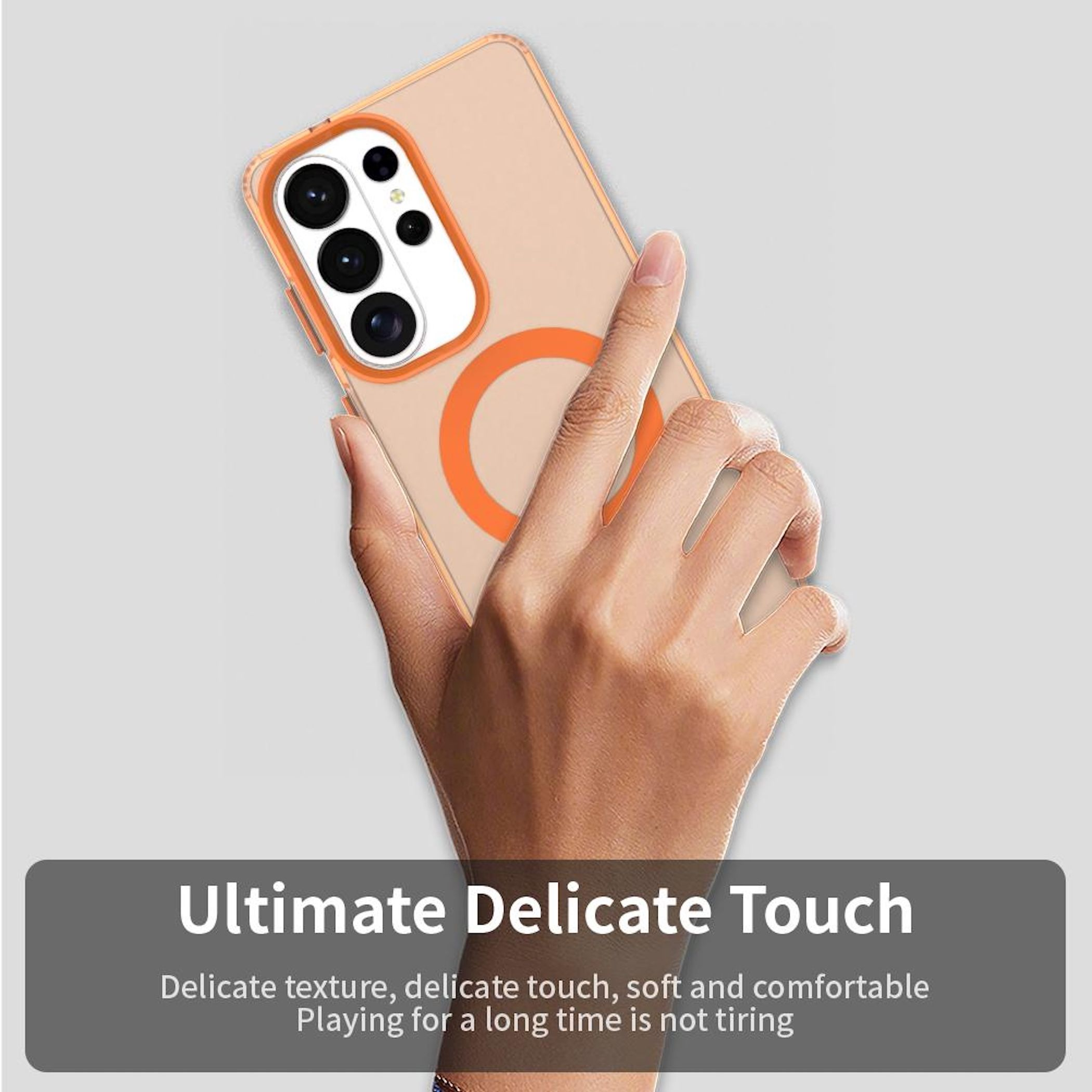 Hand hält ein Handy mit durchsichtigem Gehäuse und orangefarbenem Ring.