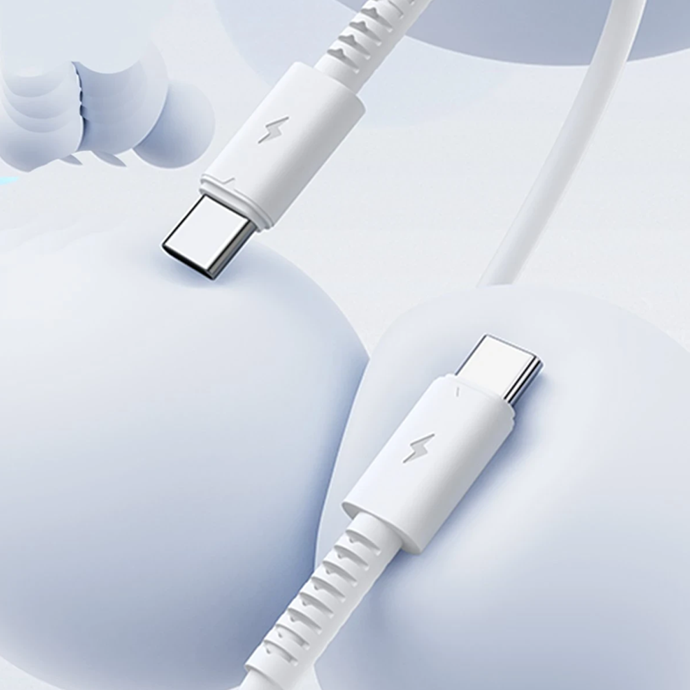 Due cavi USB-C bianchi con simbolo fulmine su sfere blu.