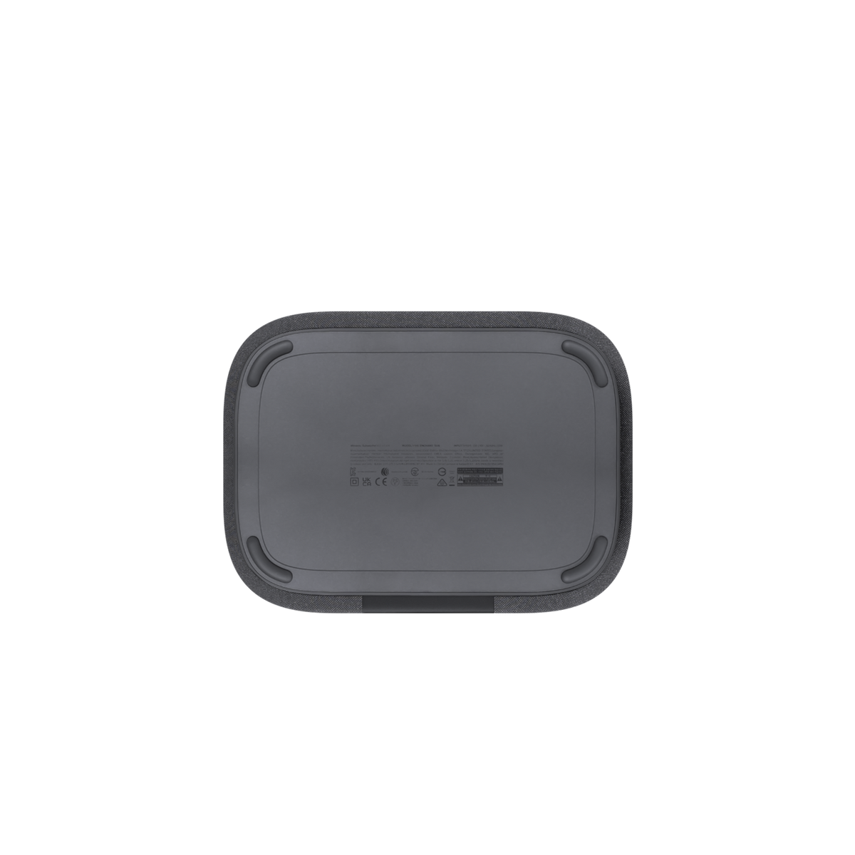 Spód szarego głośnika z etykietami i gumowymi nóżkami.