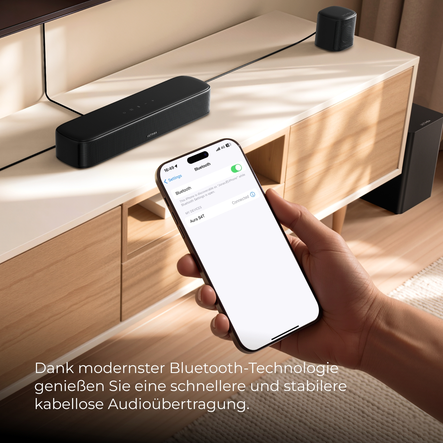 Ein iPhone verbindet sich mit einem Lautsprecher über Bluetooth.