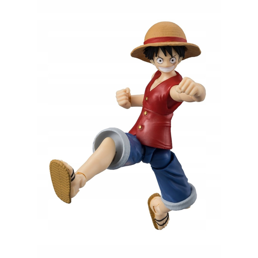 Figurka Monkey D. Luffy w akcji, w słomkowym kapeluszu, czerwonej kamizelce i niebieskich spodniach.