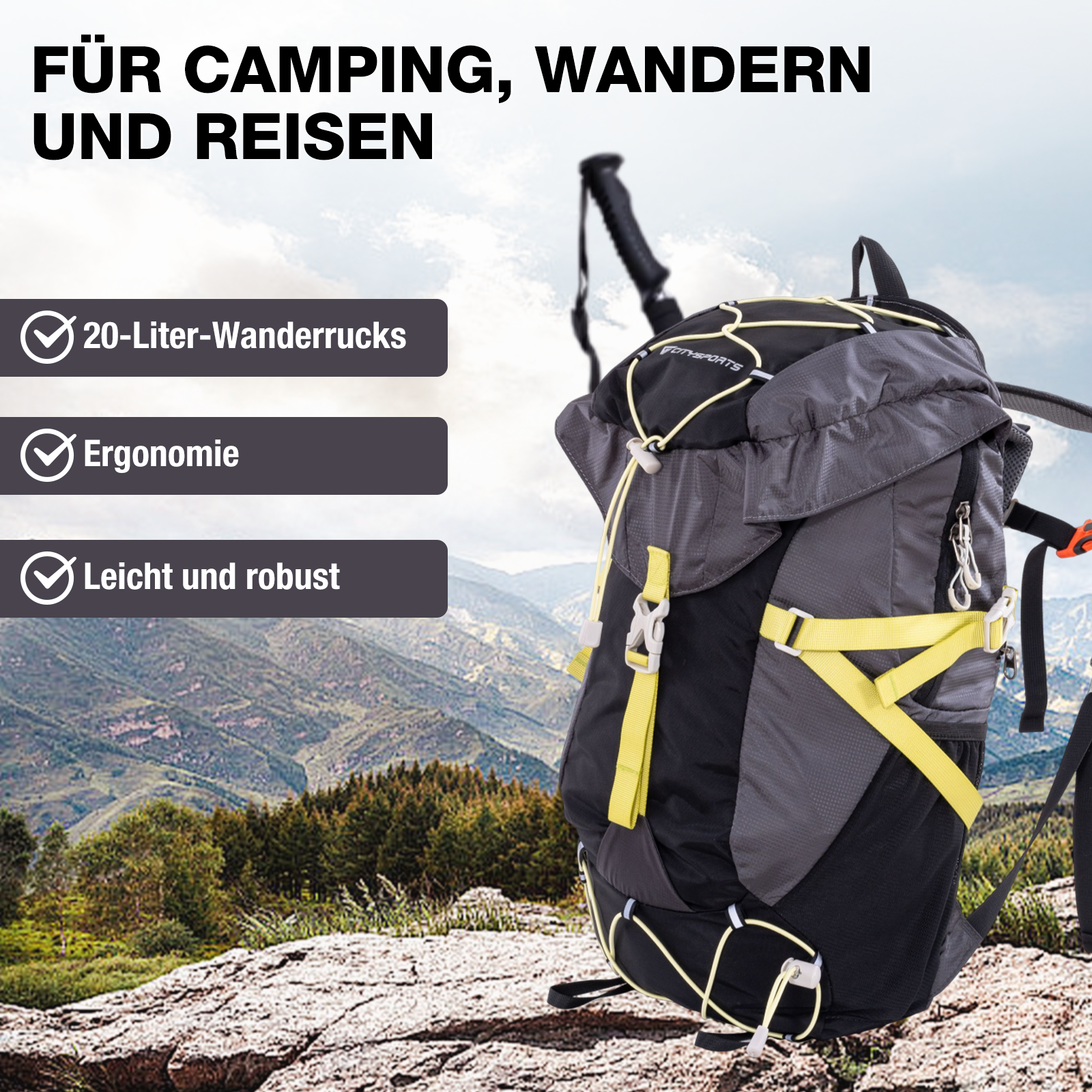 Ein Rucksack mit Wanderstöcken steht auf einem Felsen im Gebirge.