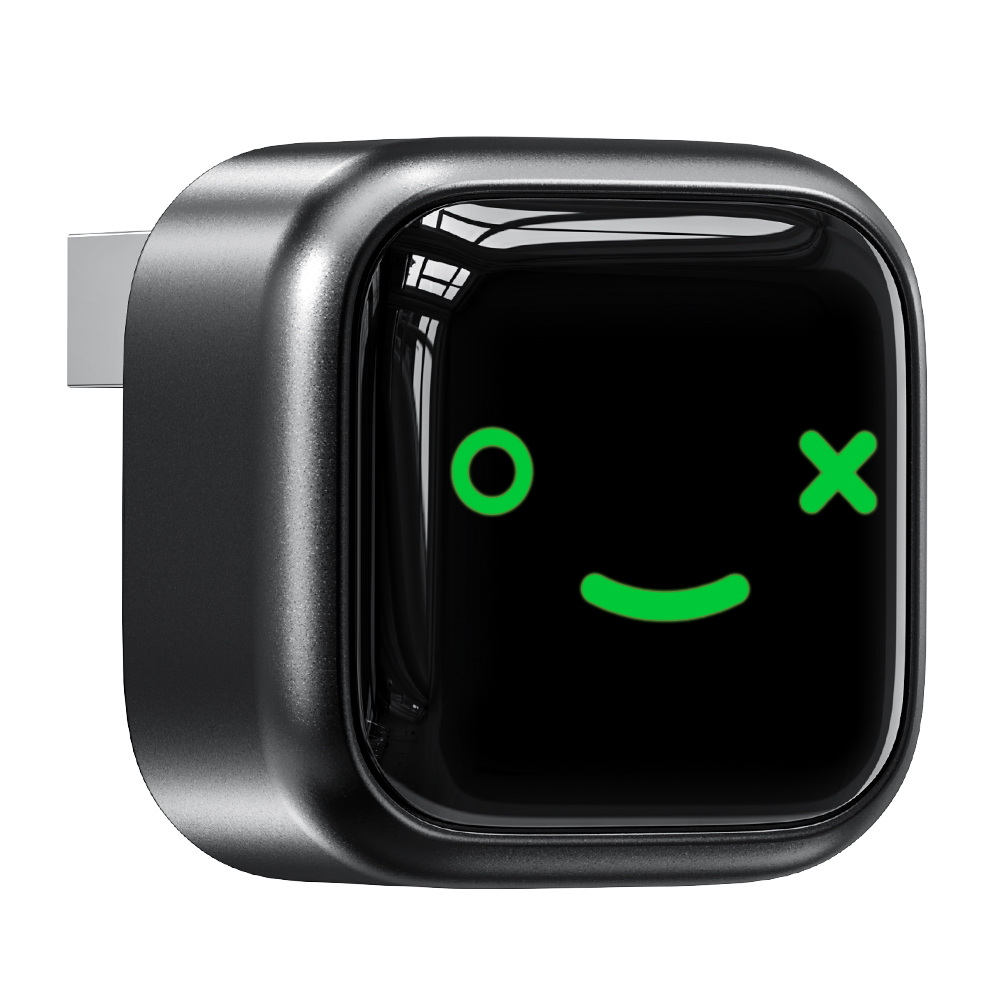 Czarny adapter USB z uroczą zieloną uśmiechniętą buźką.