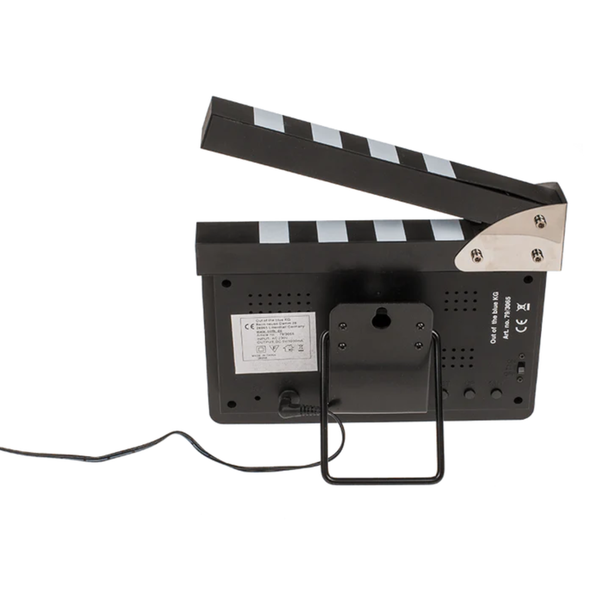 A black clapperboard with open clapsticks, standing on a support stand.