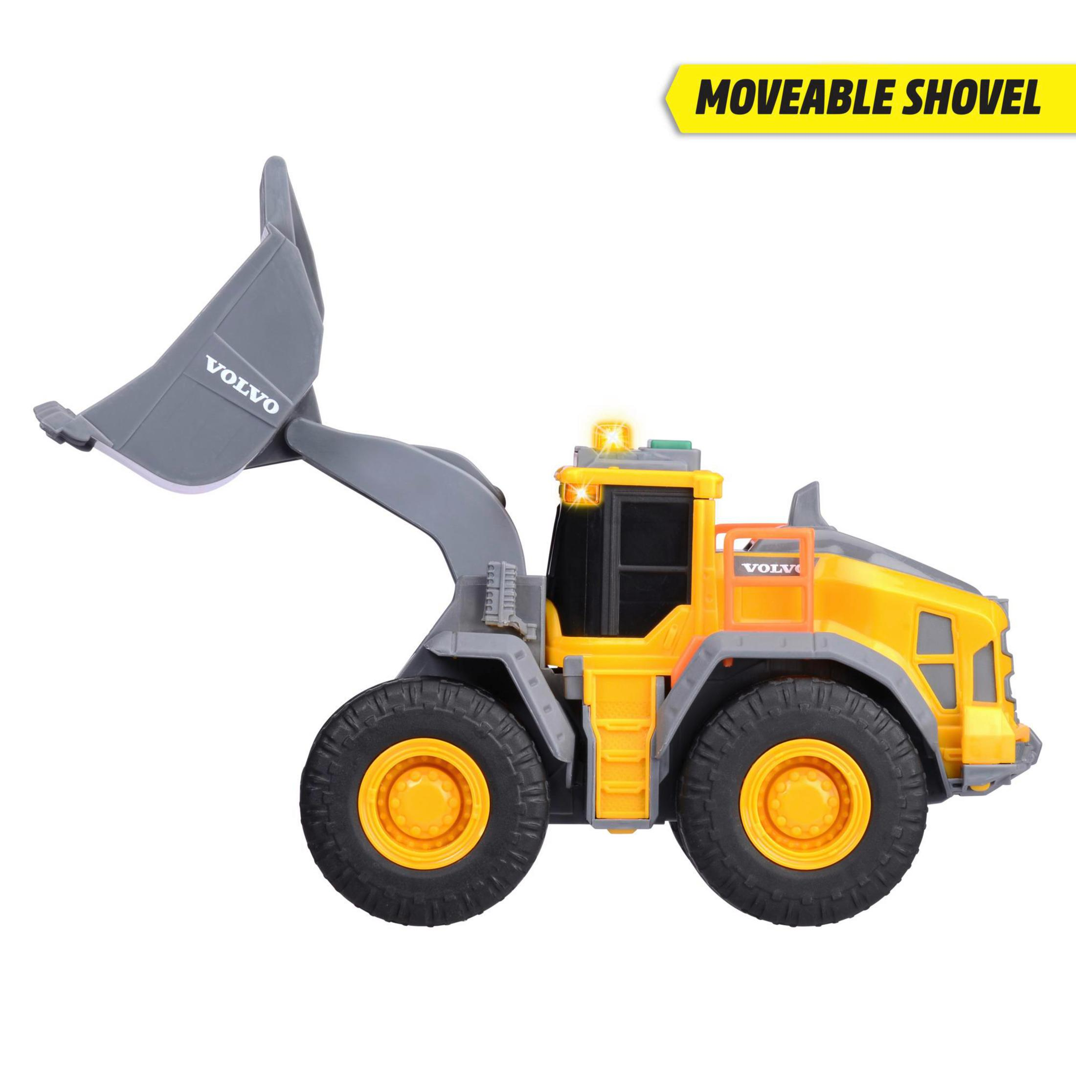 Un cargador frontal de juguete Volvo amarillo con pala móvil.