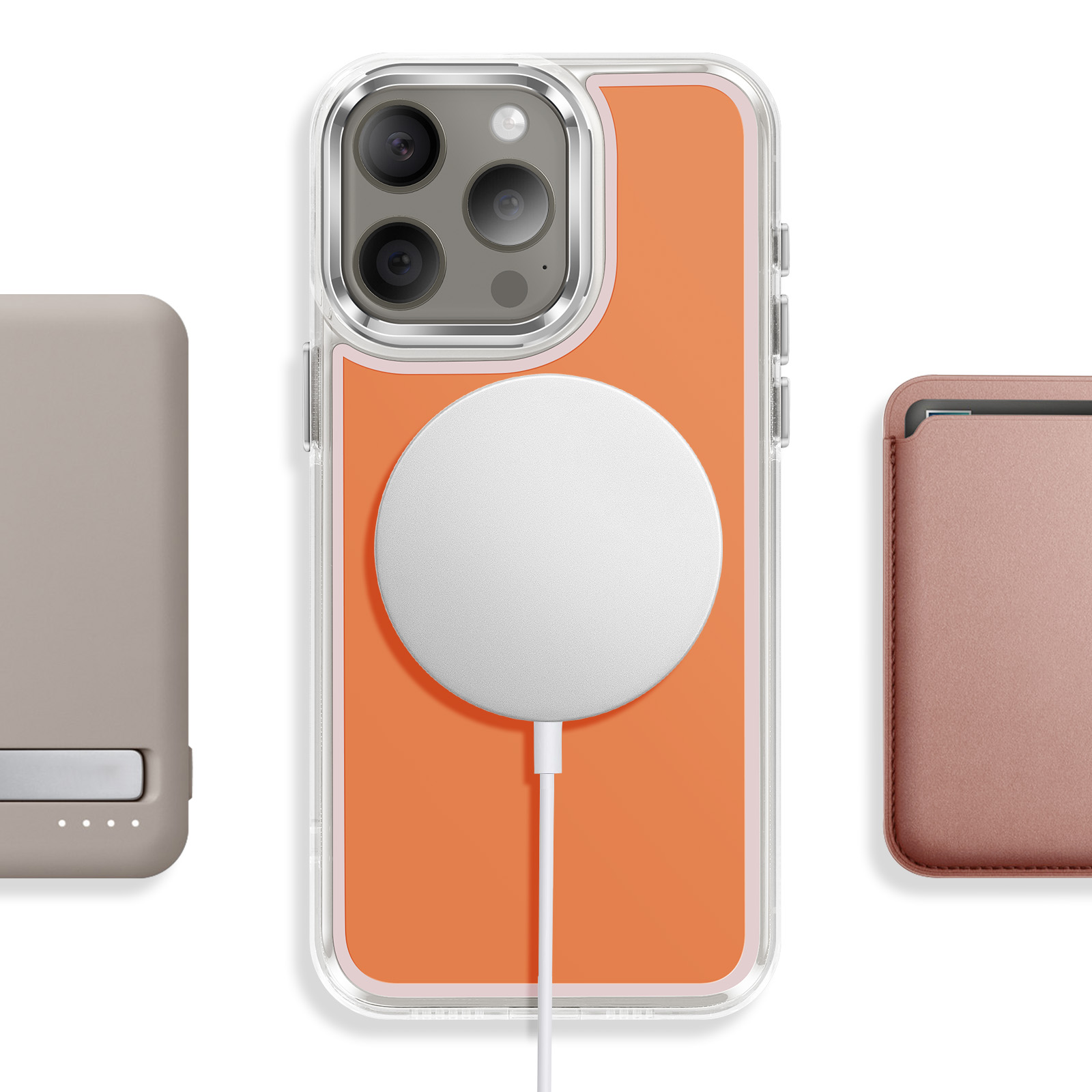 Drie telefoonhoesjes: links grijs, midden oranje met lader, rechts roze.