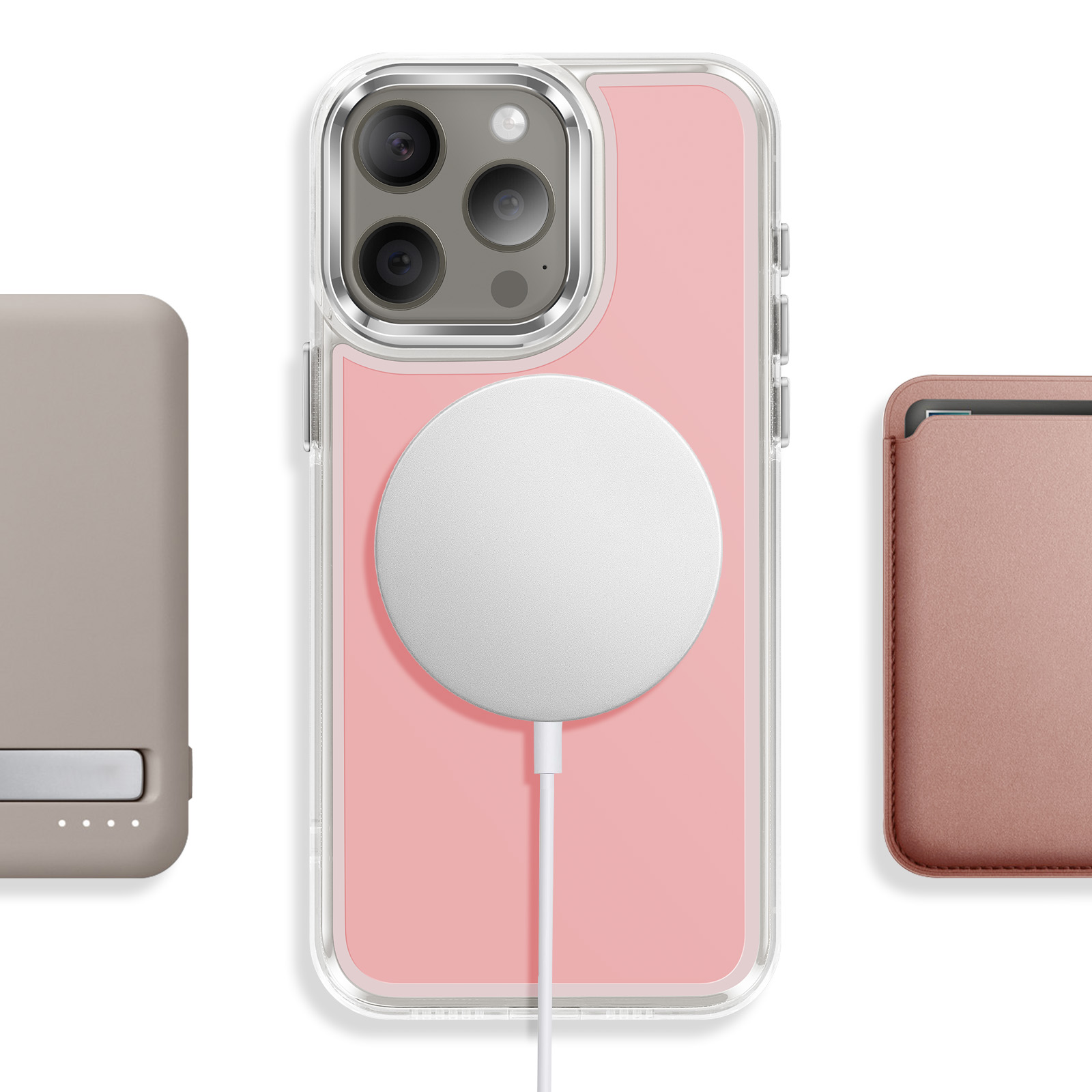 Drie accessoires: grijze powerbank, roze hoesje met witte oplader, roze portemonnee.