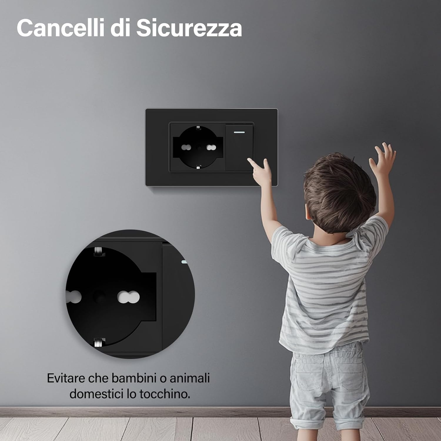Bambino tocca presa; dettaglio mostra il meccanismo di sicurezza.