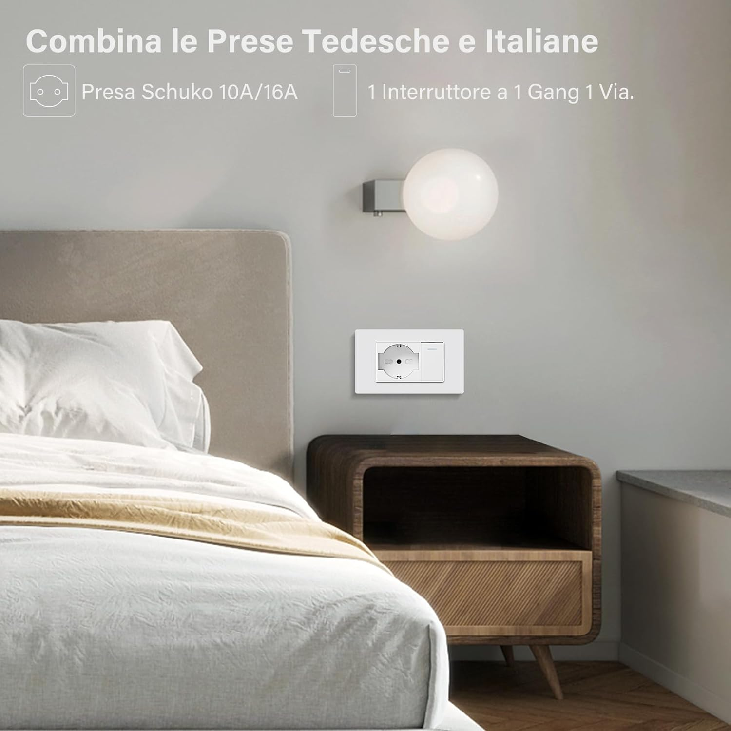 Un interruttore e una presa bianchi accanto a un tavolo di legno e un letto.