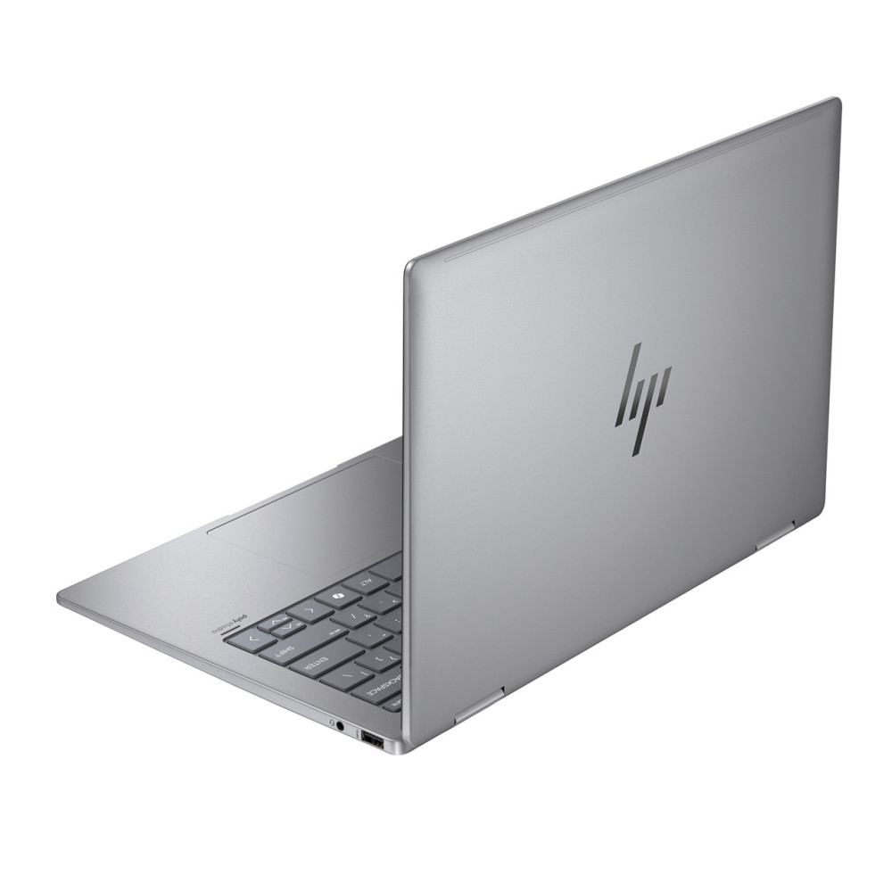 Srebrny laptop HP, otwarty, pokazujący klawiaturę i logo HP na pokrywie.
