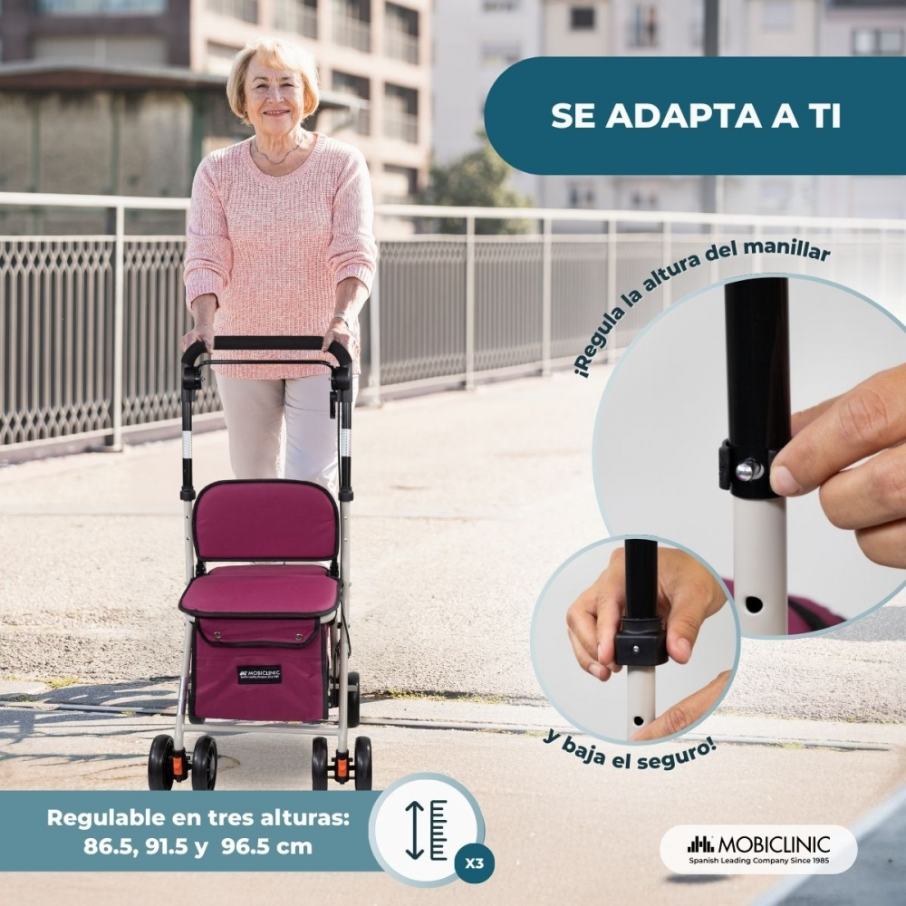 Una mujer mayor con un andador rosa, adaptándose a ella.