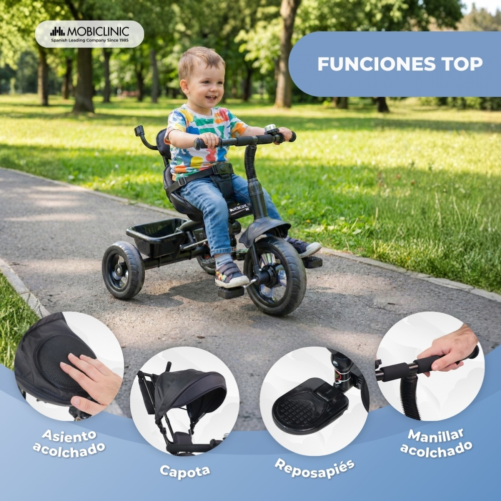 Un niño monta un triciclo en un parque, con primeros planos del asiento, toldo y manillar.