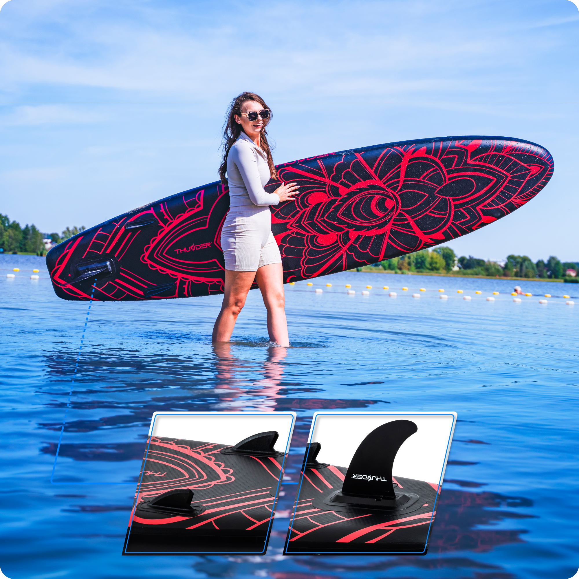 Kobieta stoi w wodzie, trzymając deskę SUP z czerwonym wzorem.