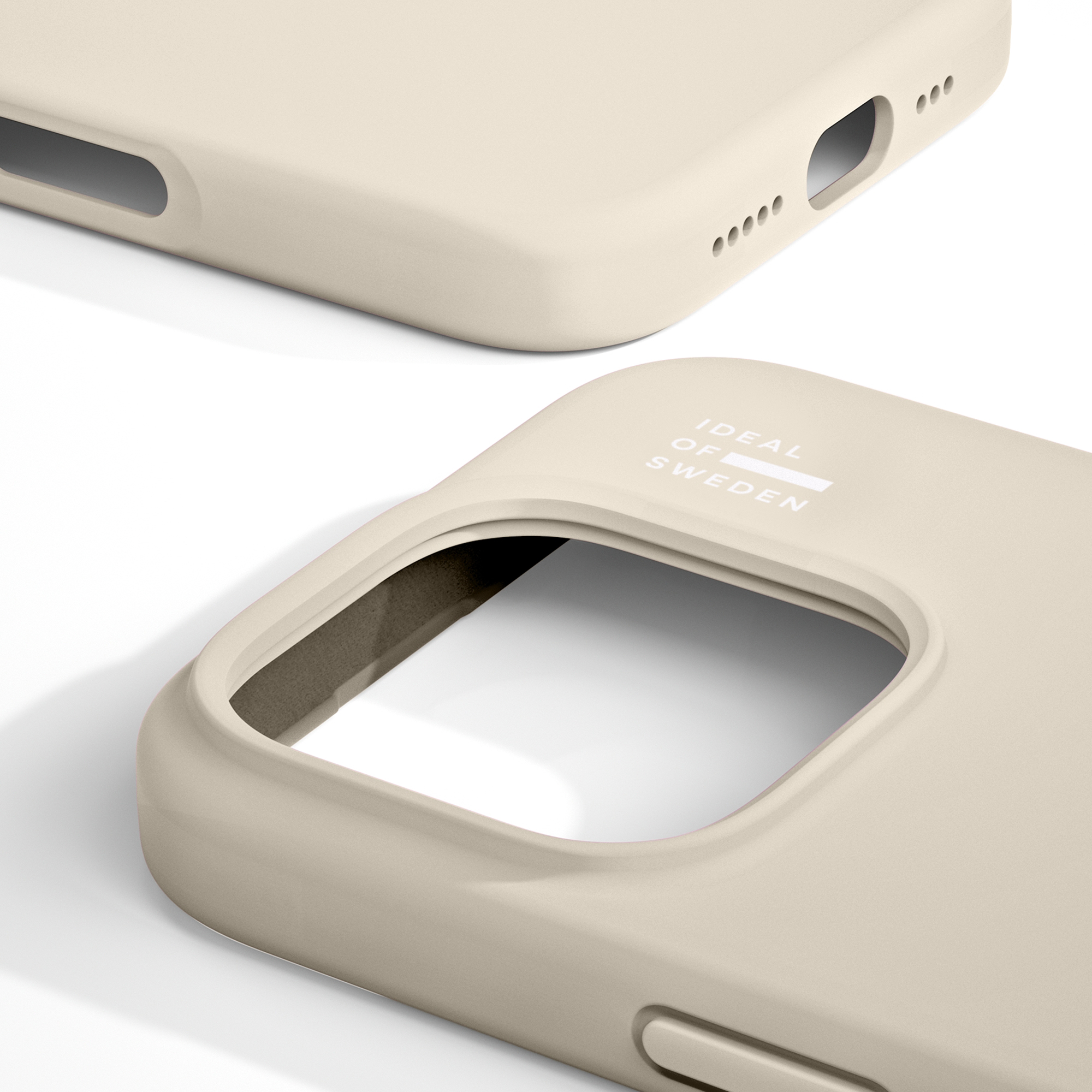 Two beige phone cases on a white background, one close up and one further away.