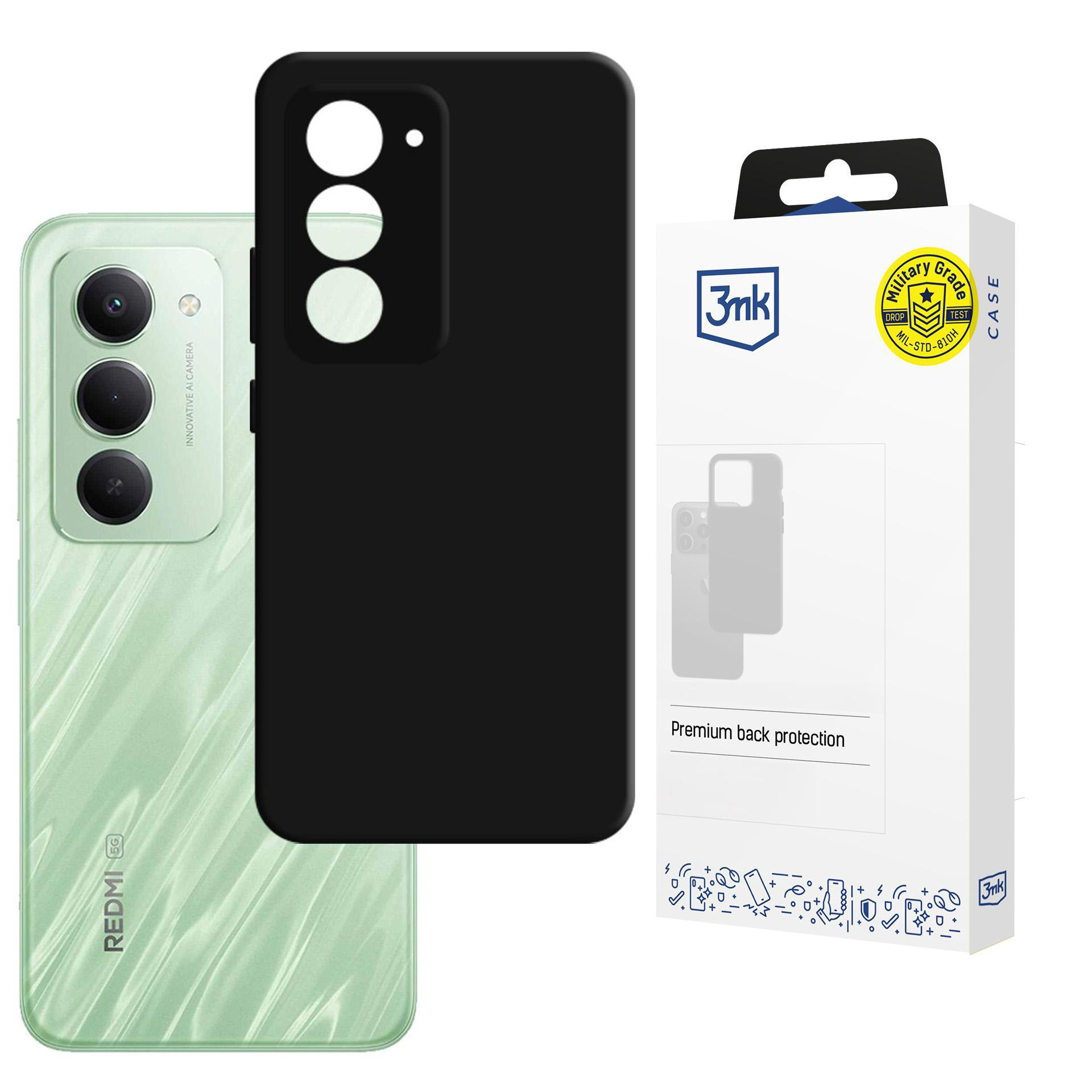 Jasnozielony telefon Redmi z czarnym etui i opakowaniem.