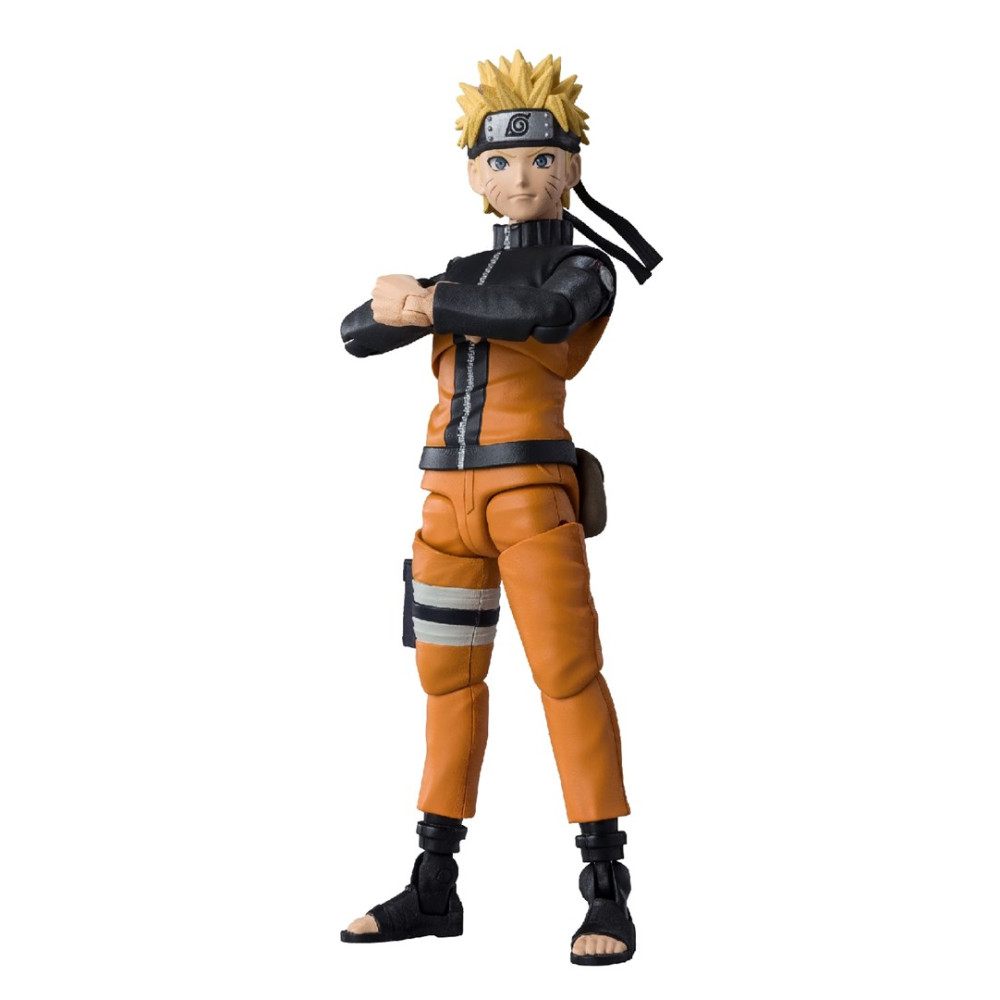 Figurka akcji Naruto Uzumaki w pomarańczowym stroju ze skrzyżowanymi ramionami.