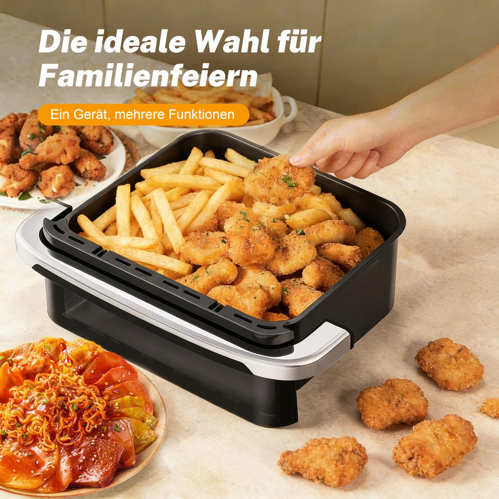Heißluftfritteuse mit Pommes, Nuggets und Hähnchenflügeln.
