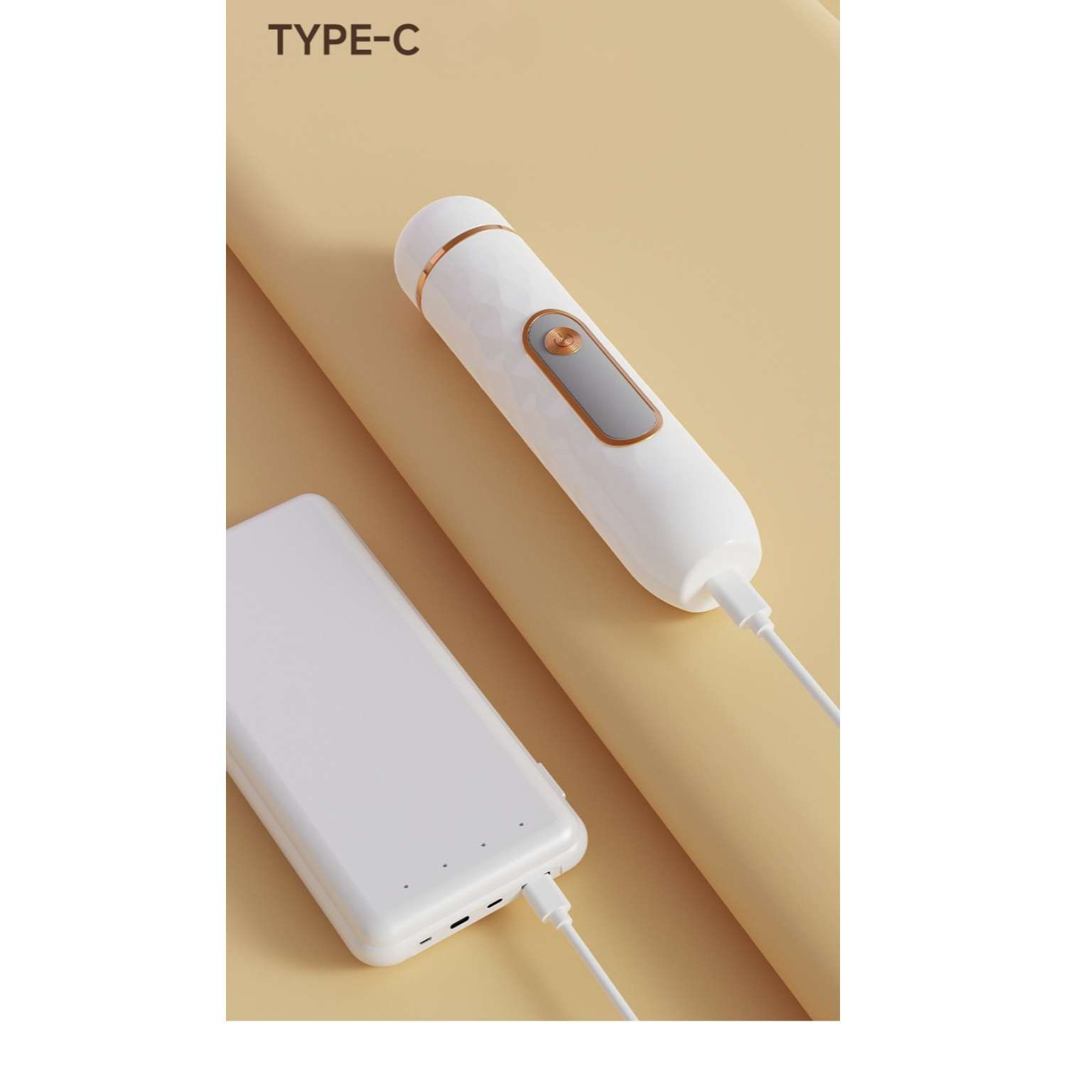 Ein weißes Handgerät wird über ein weißes Kabel mit einer Powerbank verbunden.
