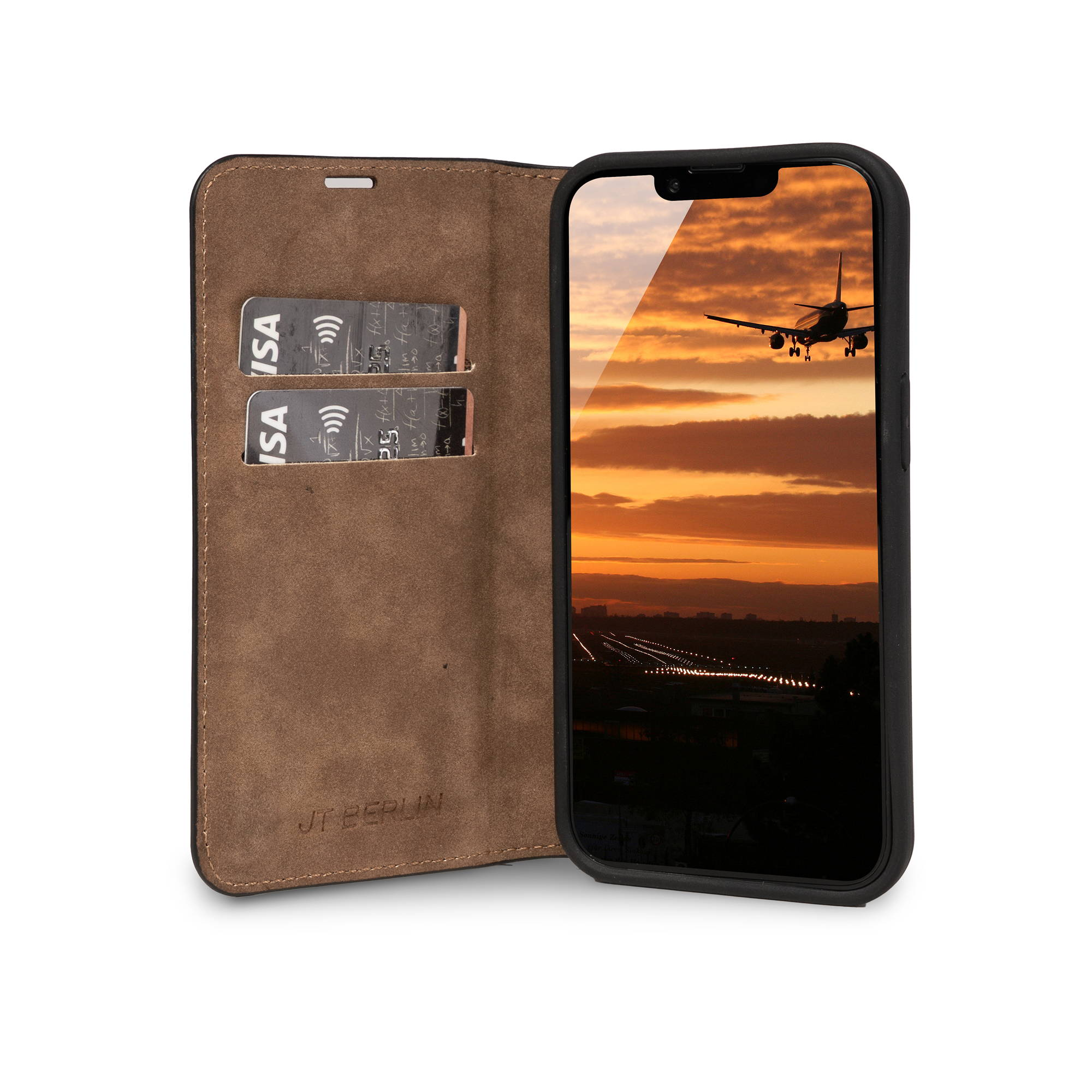 Ein Handy mit einer offenen braunen Hülle. Das Display zeigt ein Flugzeug bei Sonnenuntergang.