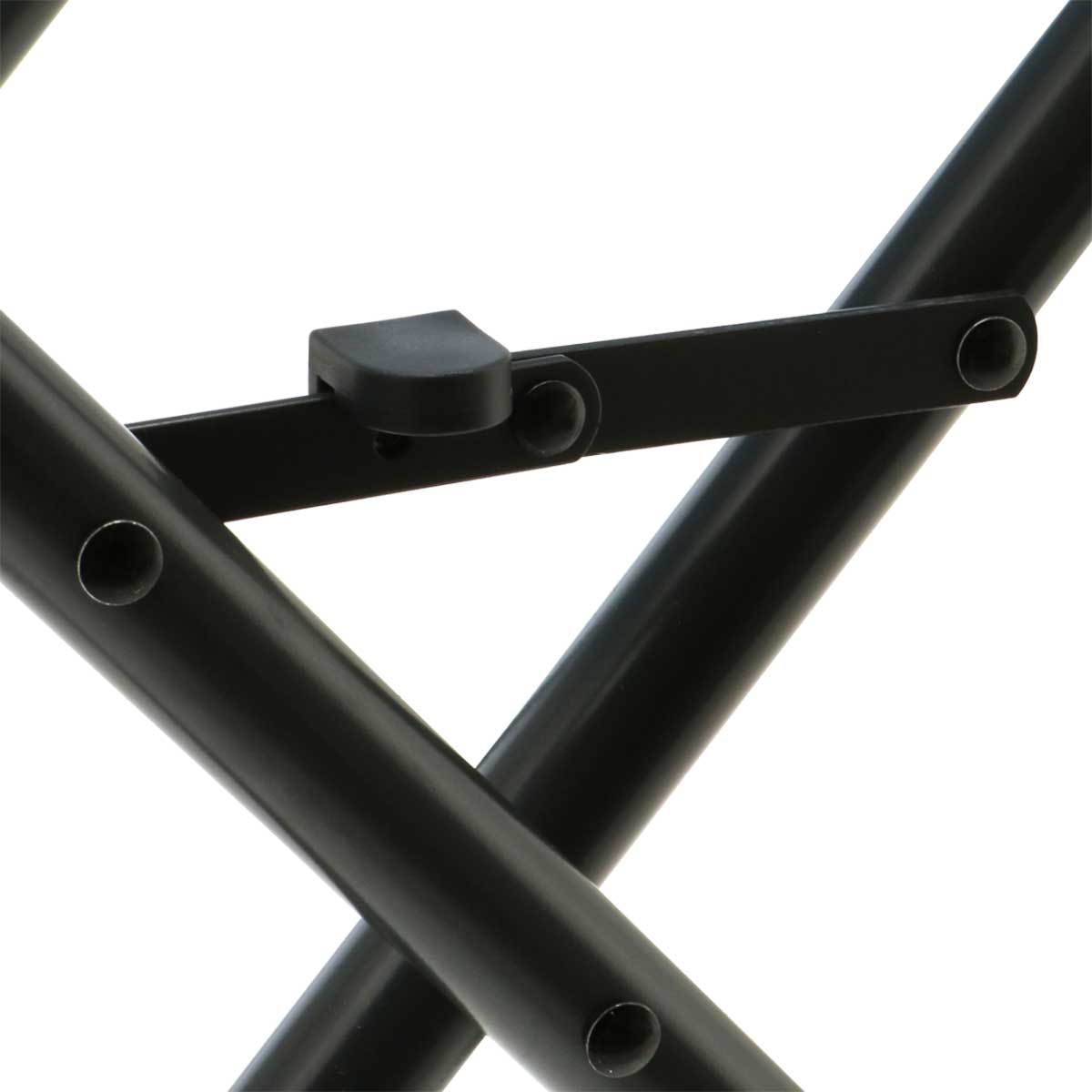 Close-up of a black folding chair joint with visible rivets.