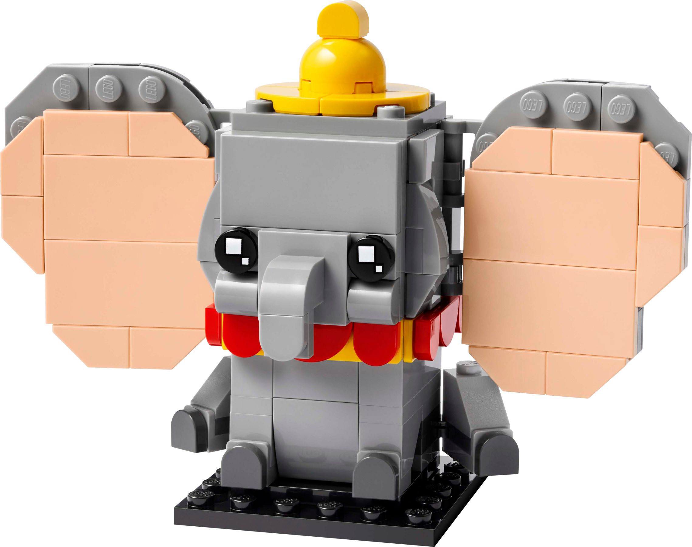 Ein grauer Lego-Elefant mit großen rosafarbenen Ohren und einem gelben Hut.